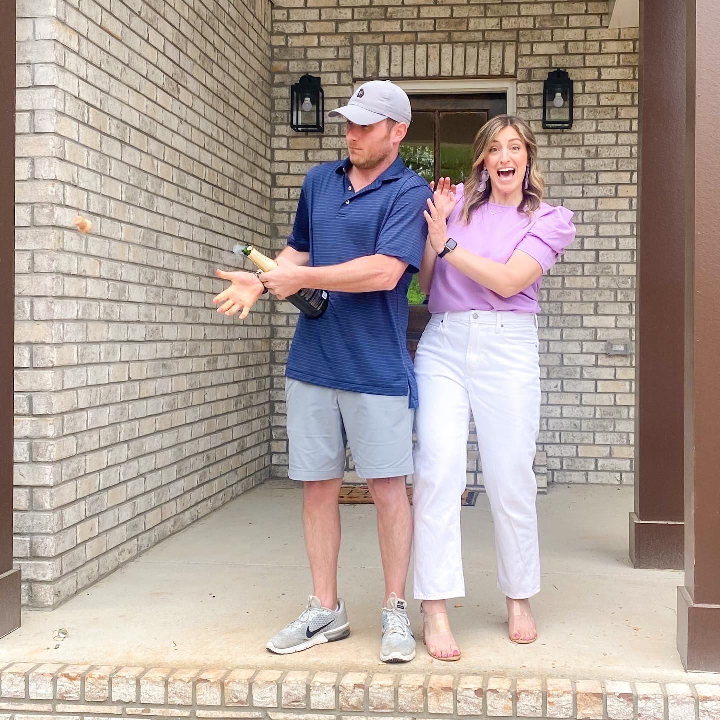 Popping champagne after Chad popped the question! 