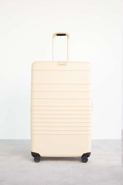The 29" Large Check-In Roller IN BEIGE