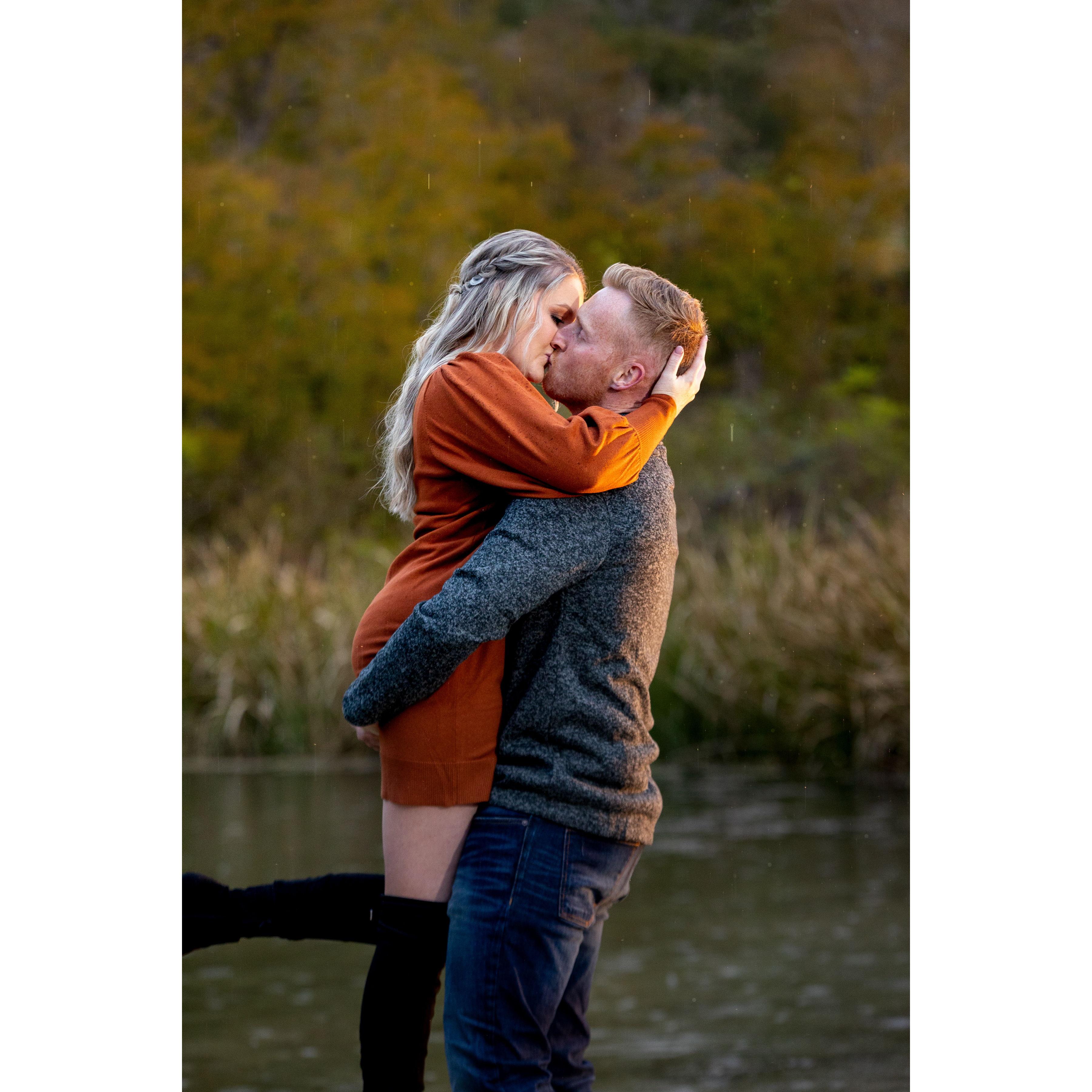 It started raining on us mid-engagement shoot. Our photographer thankfully went with it and we continued and got this, my favorite shot. "If you're a bird, I'm a bird."