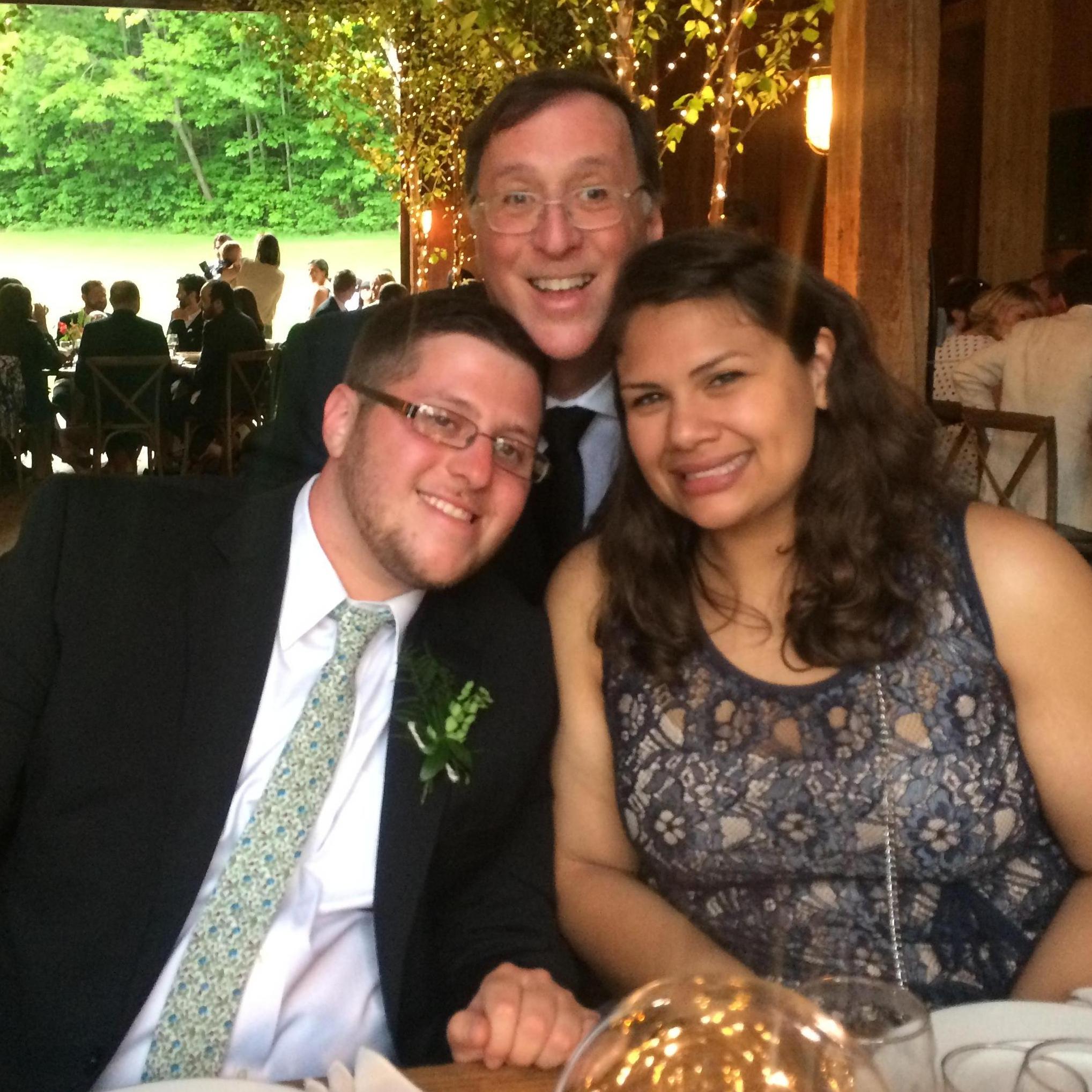 While taking a nice photo at Jason and Becky's wedding, Harri's dad did a classic photobomb!