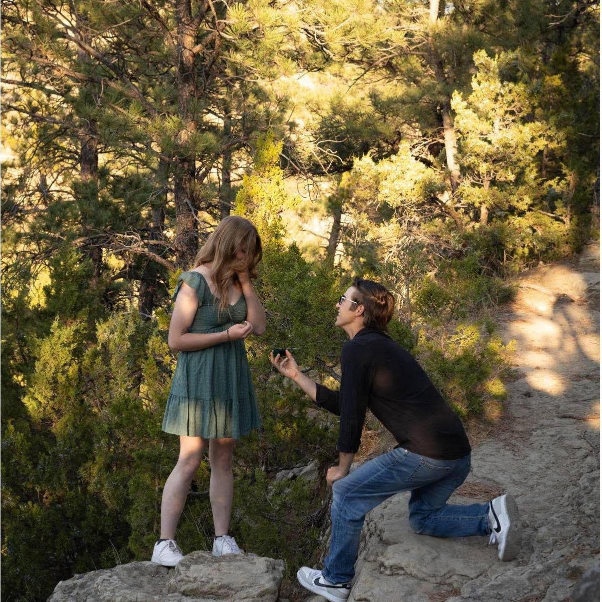 The moment Faith said "yes" to spending the rest of her life with my best friend! Ty proposed right where we had our first ever date and talked for hours!