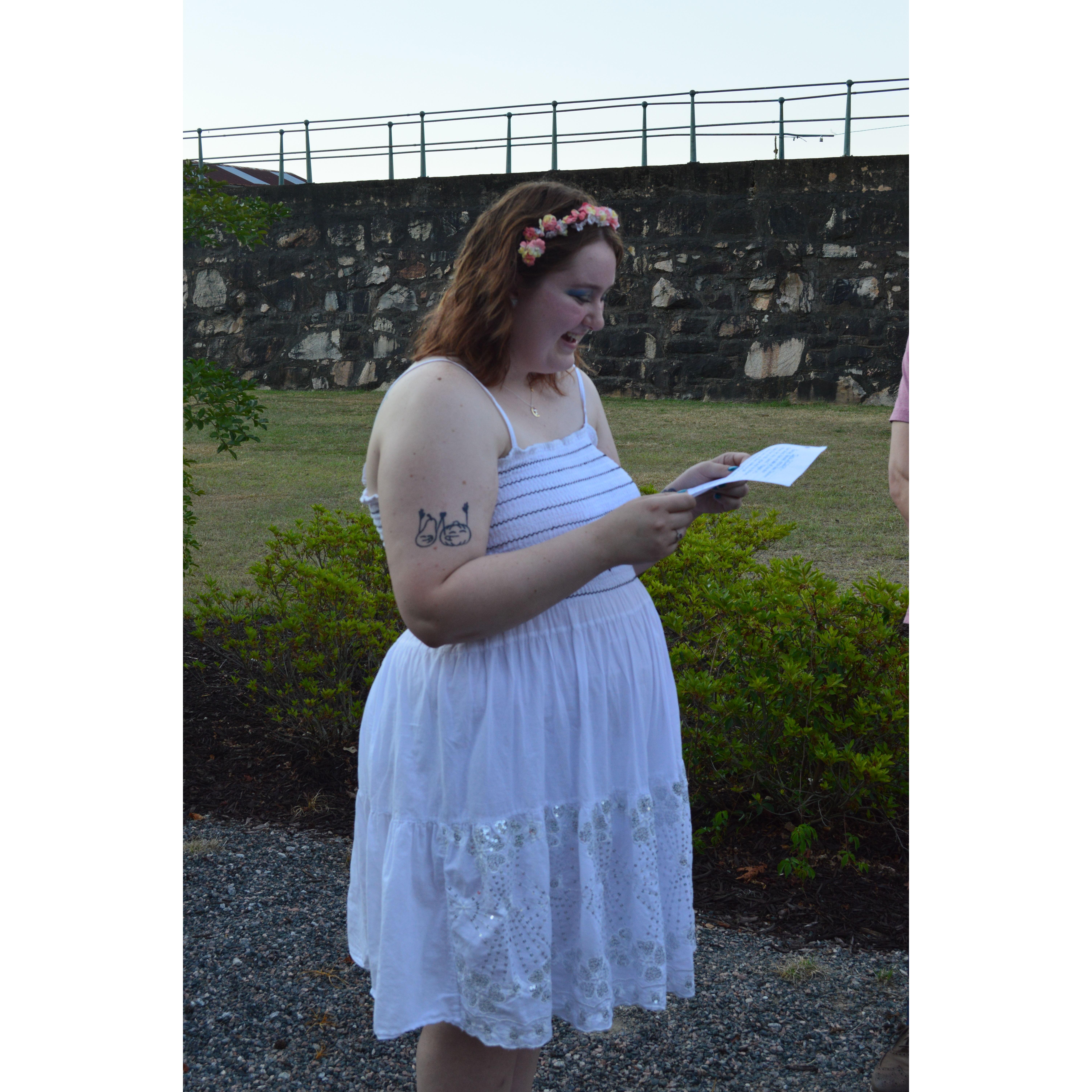 Kaitlin reading her vows