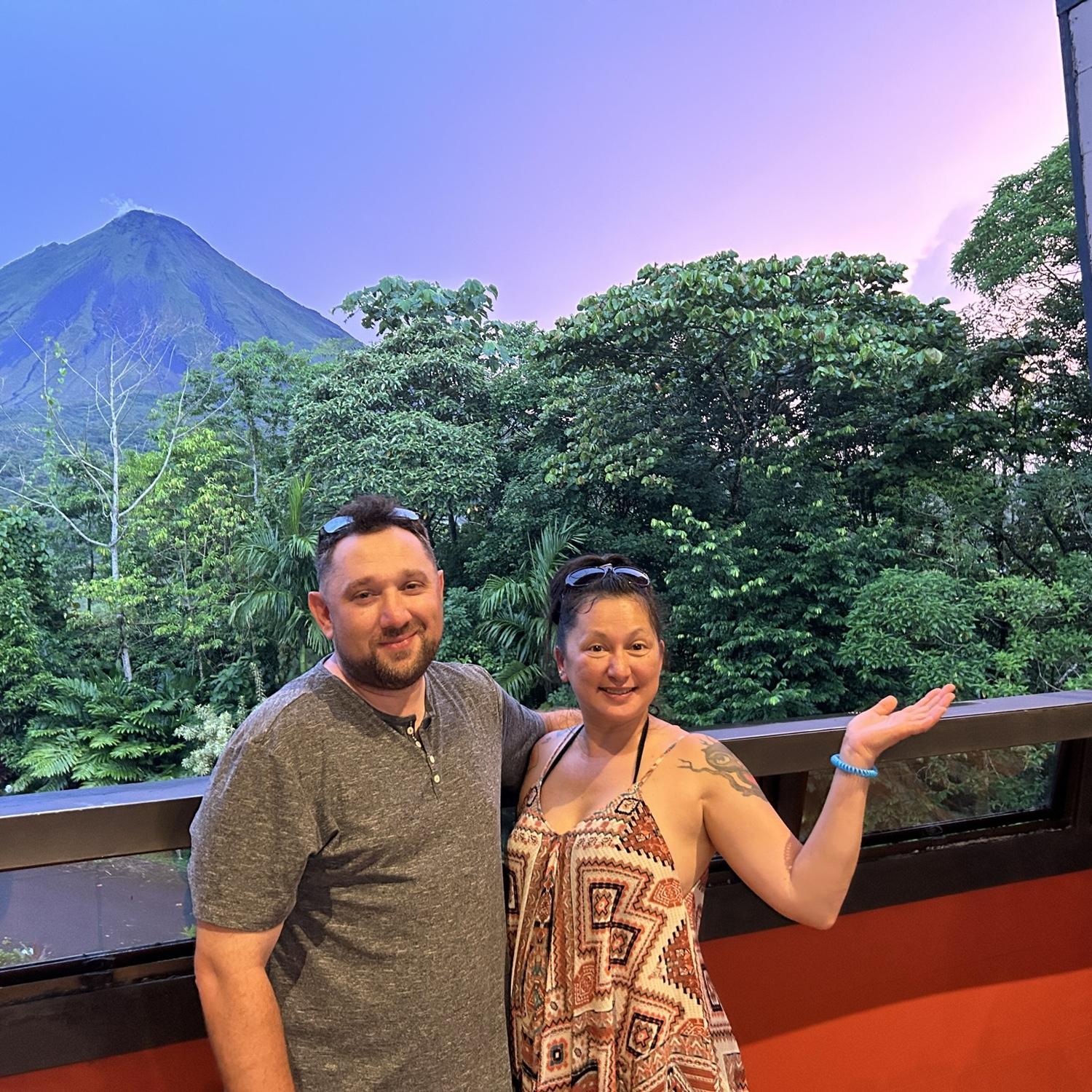 It’s not a painting! That’s really the volcano at sunset!