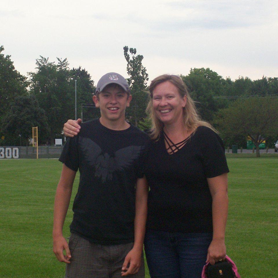 West Carroll football with Mom