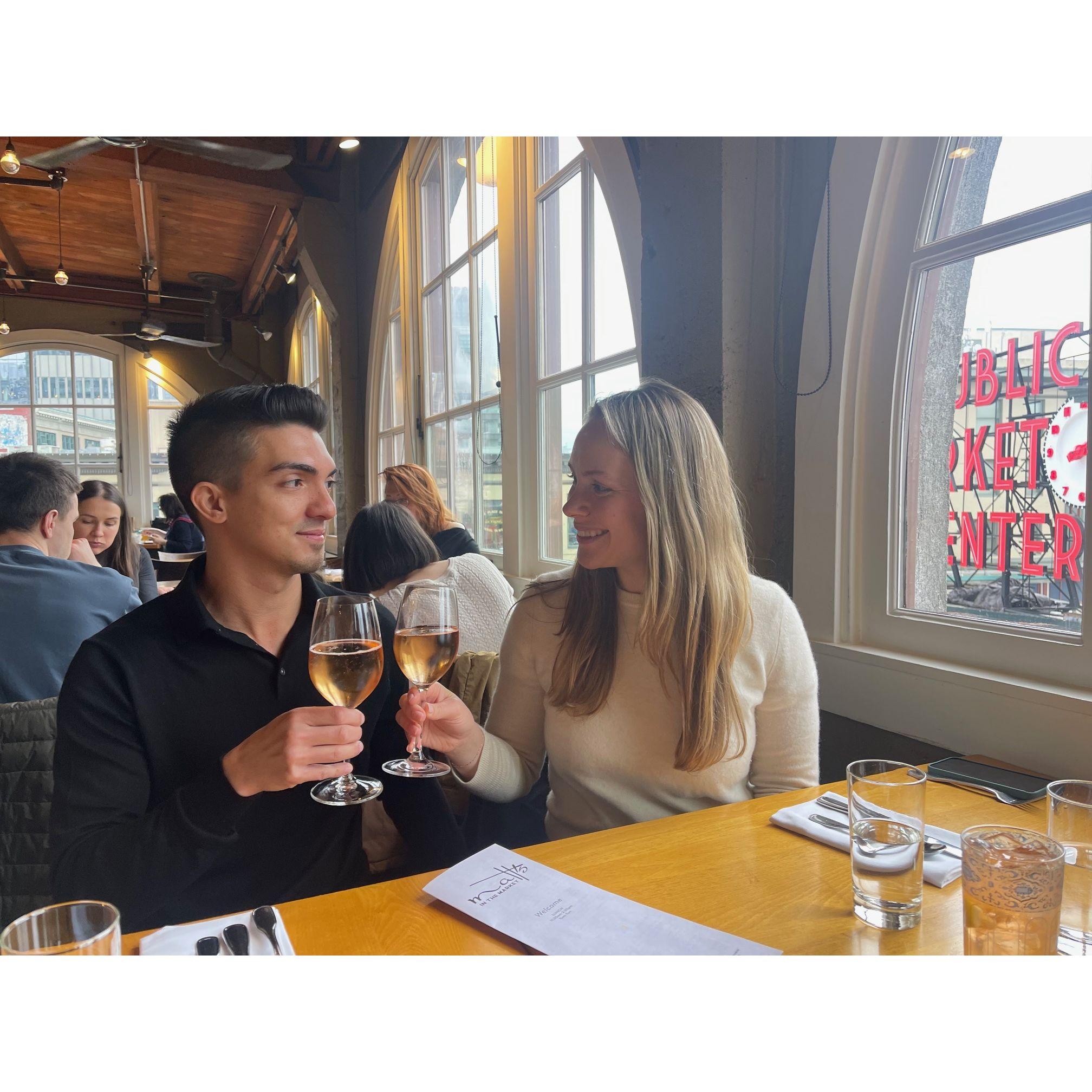 Cheersing after we picked out our wedding venue!