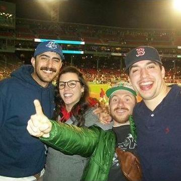 Maya and Trey with Trey's co-best man and groomsman, Nick and Max at Fenway Park, Boston