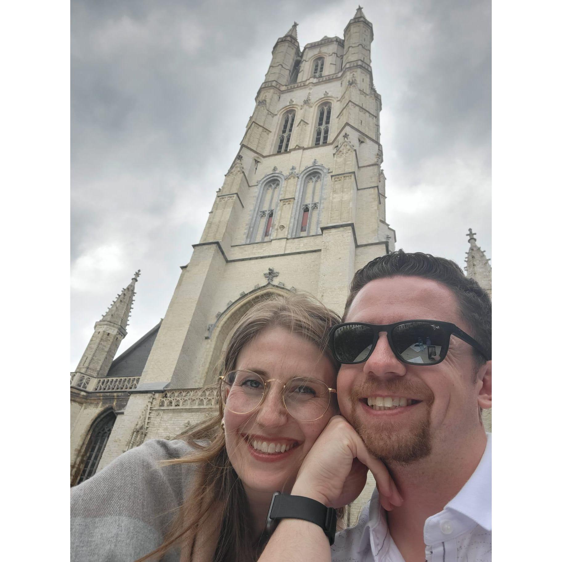 Taking a break at a cafe in Ghent, Belgium in front of a massive church!