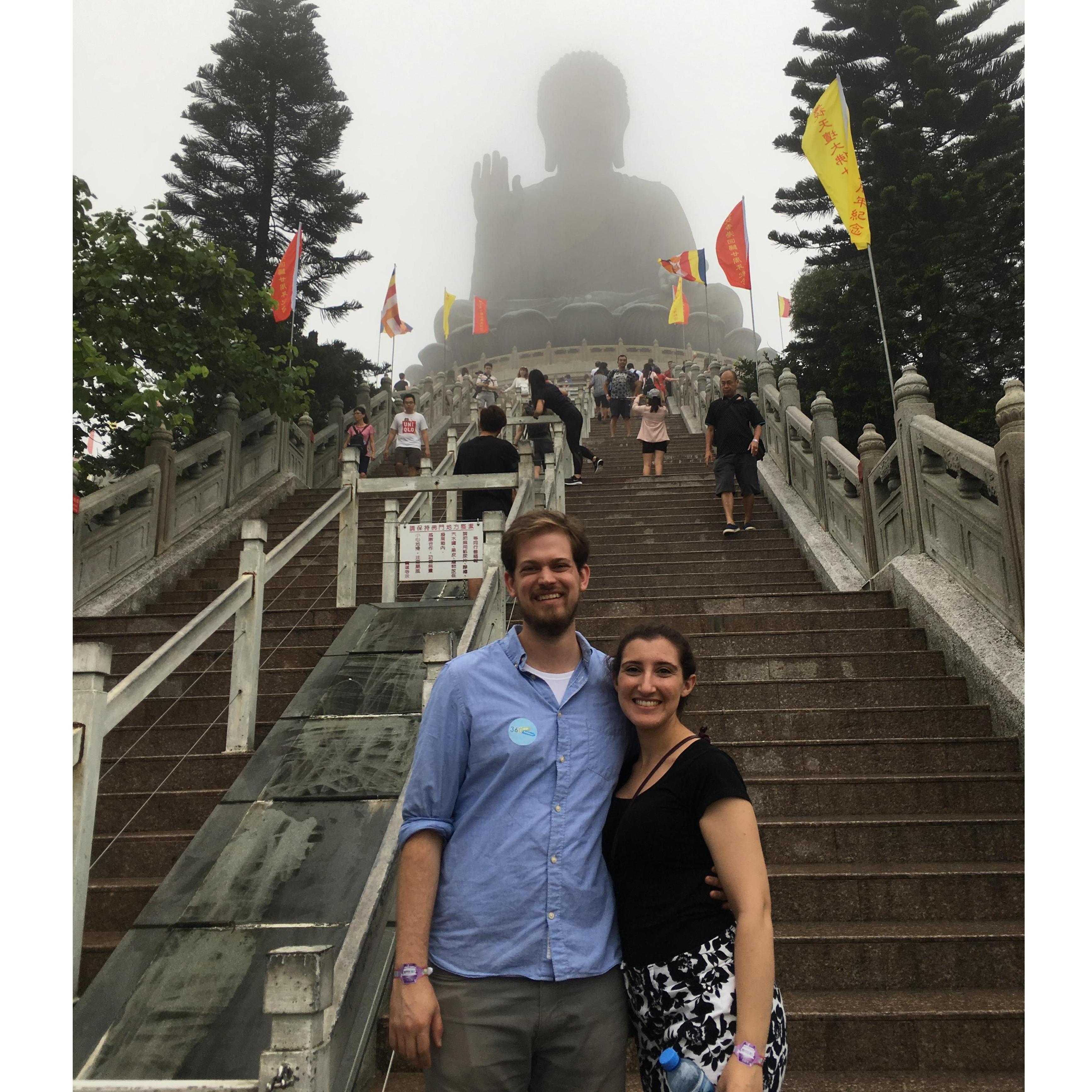 At the Big Buddha statue in Hong Kong. We had to take a photo every 5 steps, but this one turned out the best, I guess. -- Chris