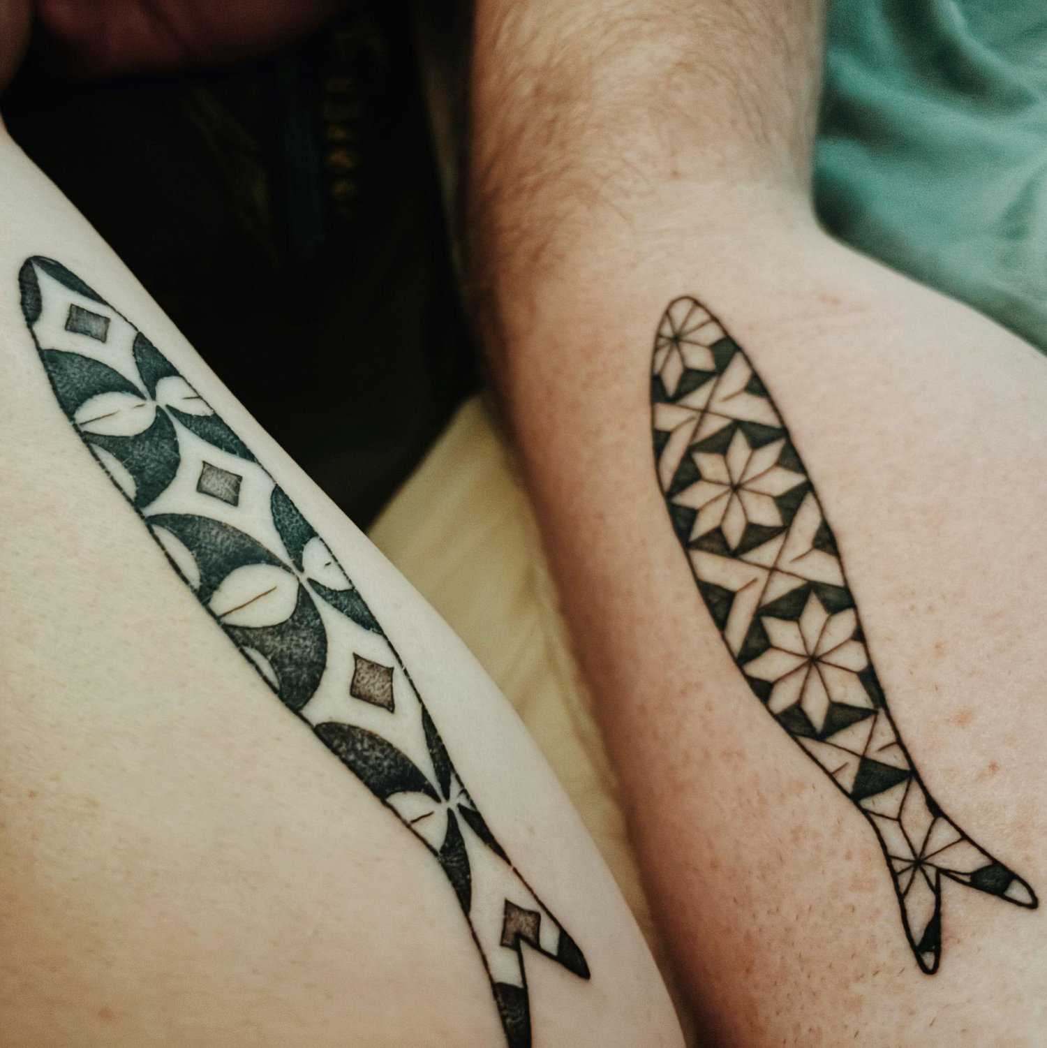 Our sardine tattoos! (These are arms.)