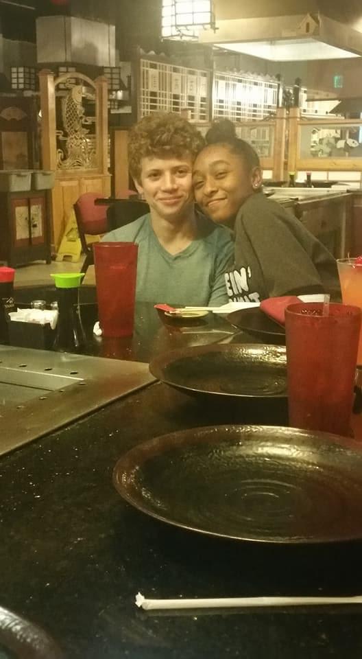 Us at a hibachi restaurant with my family, Dec. 2017. Still one of our favorite places to go.