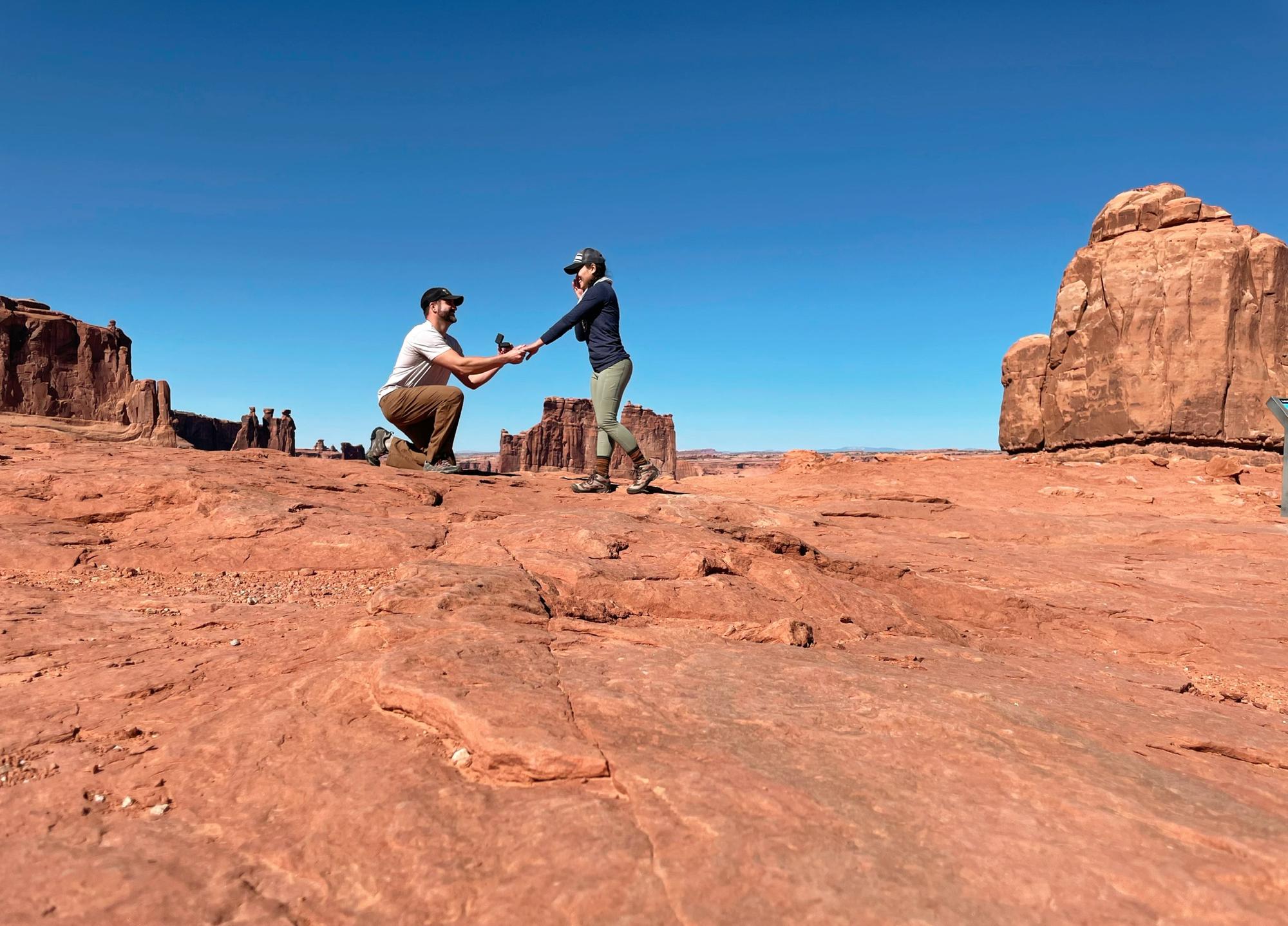 Re-enactment of Tim's actual proposal. 

Arches National Park, Moab, UT