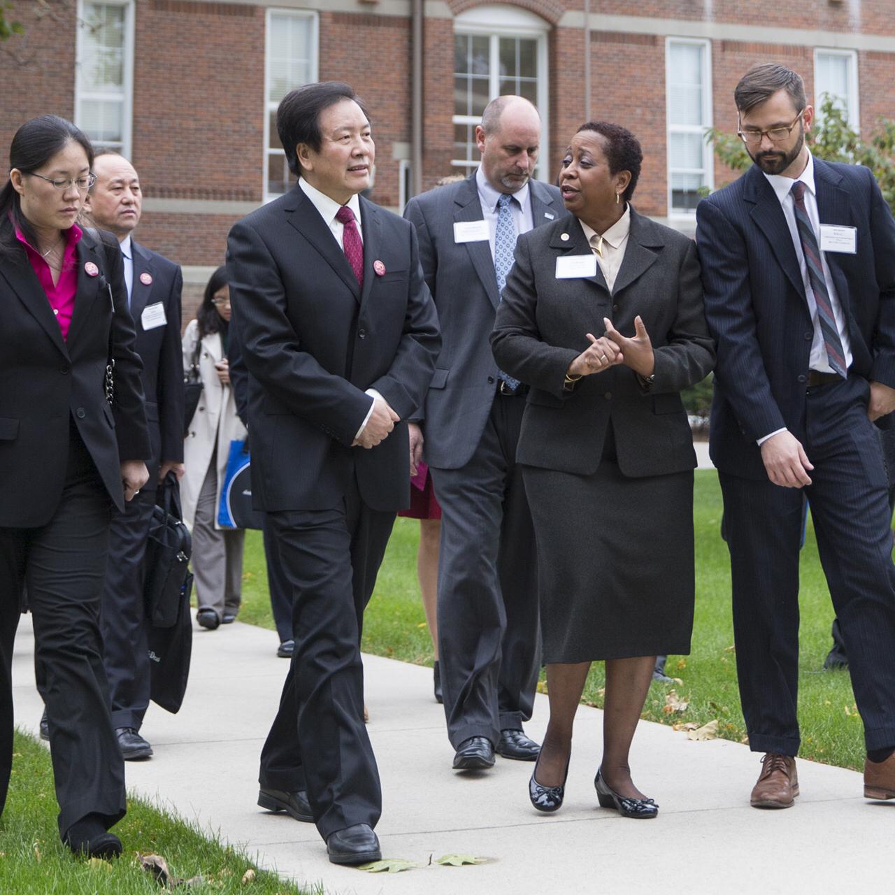 Deneese hosts the Secretary of Education from China at Drake University.