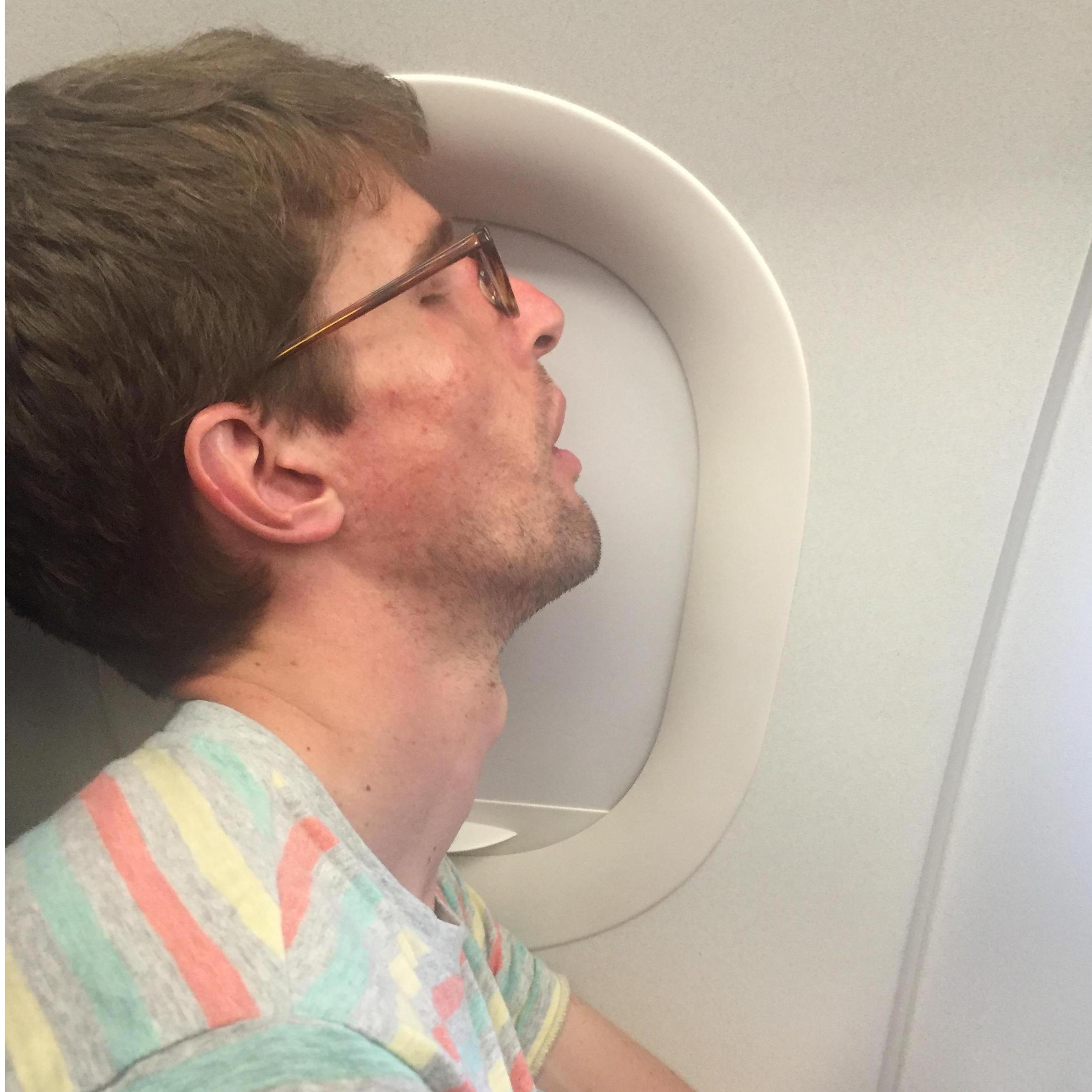 Alex sleeping on our way to Hawaii in July of 2017. We had a fun time there celebrating our friends, Nate and Kim's wedding and learning about the reality show Terrace House.