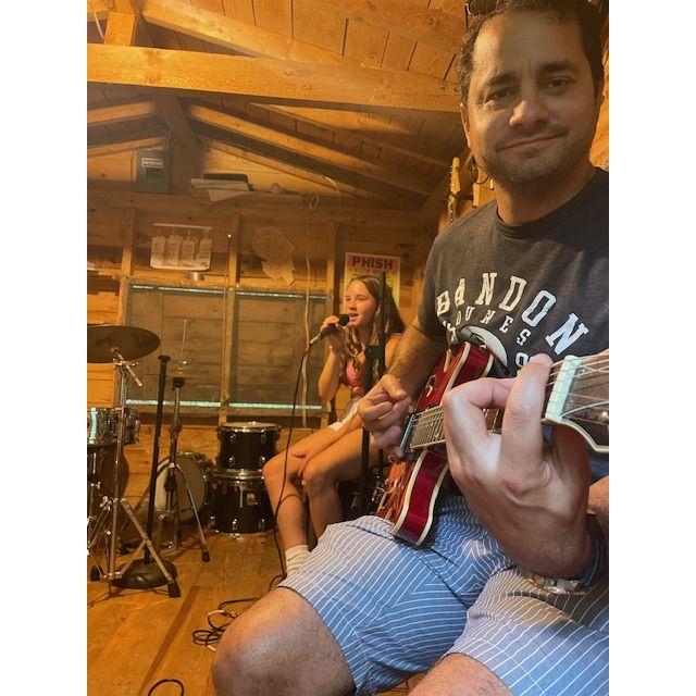 Danny jamming out with the girls in Vermont.
