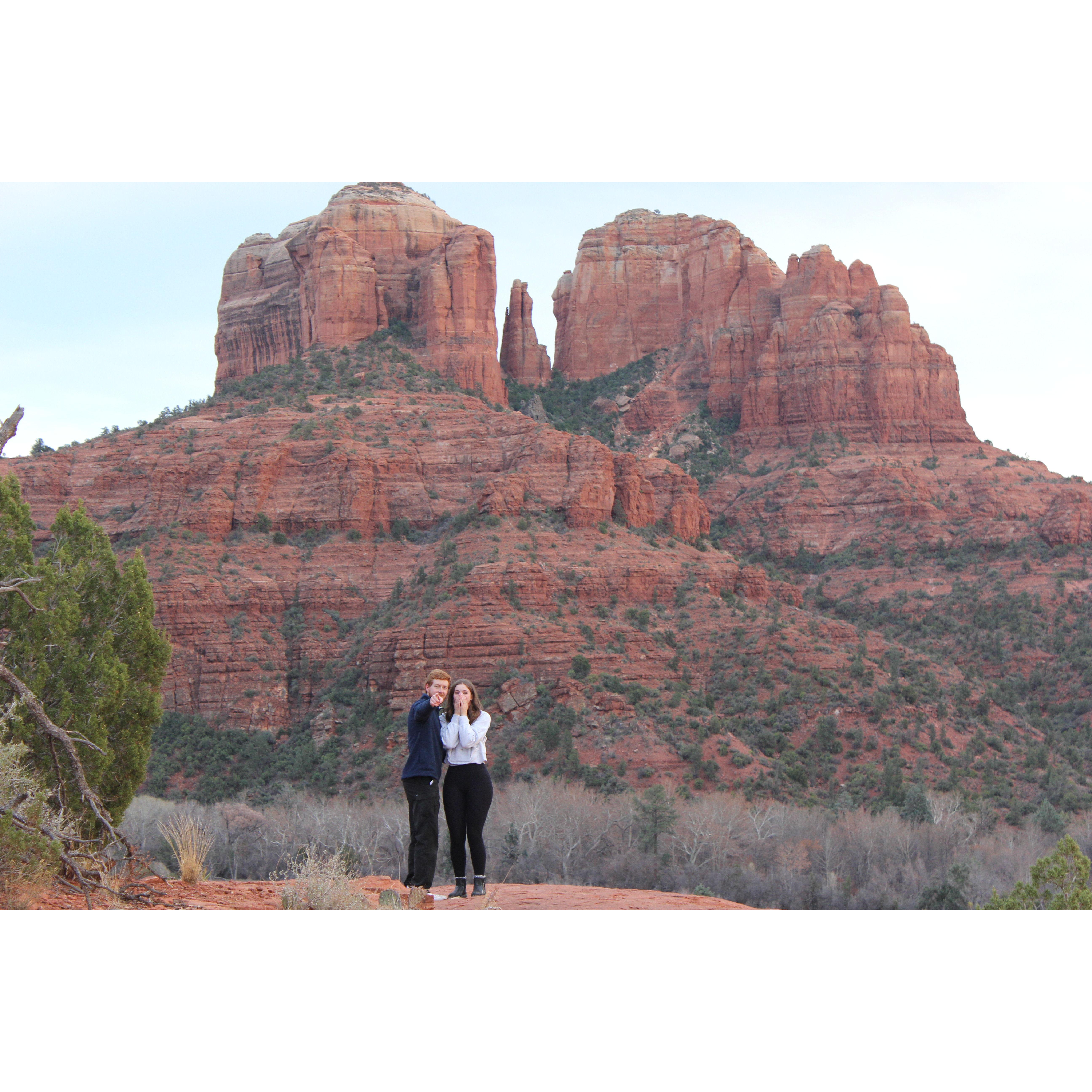 after jack proposed, this is him pointing out our friends hiding in bushes taking pics!! thank you nick and raine! <3