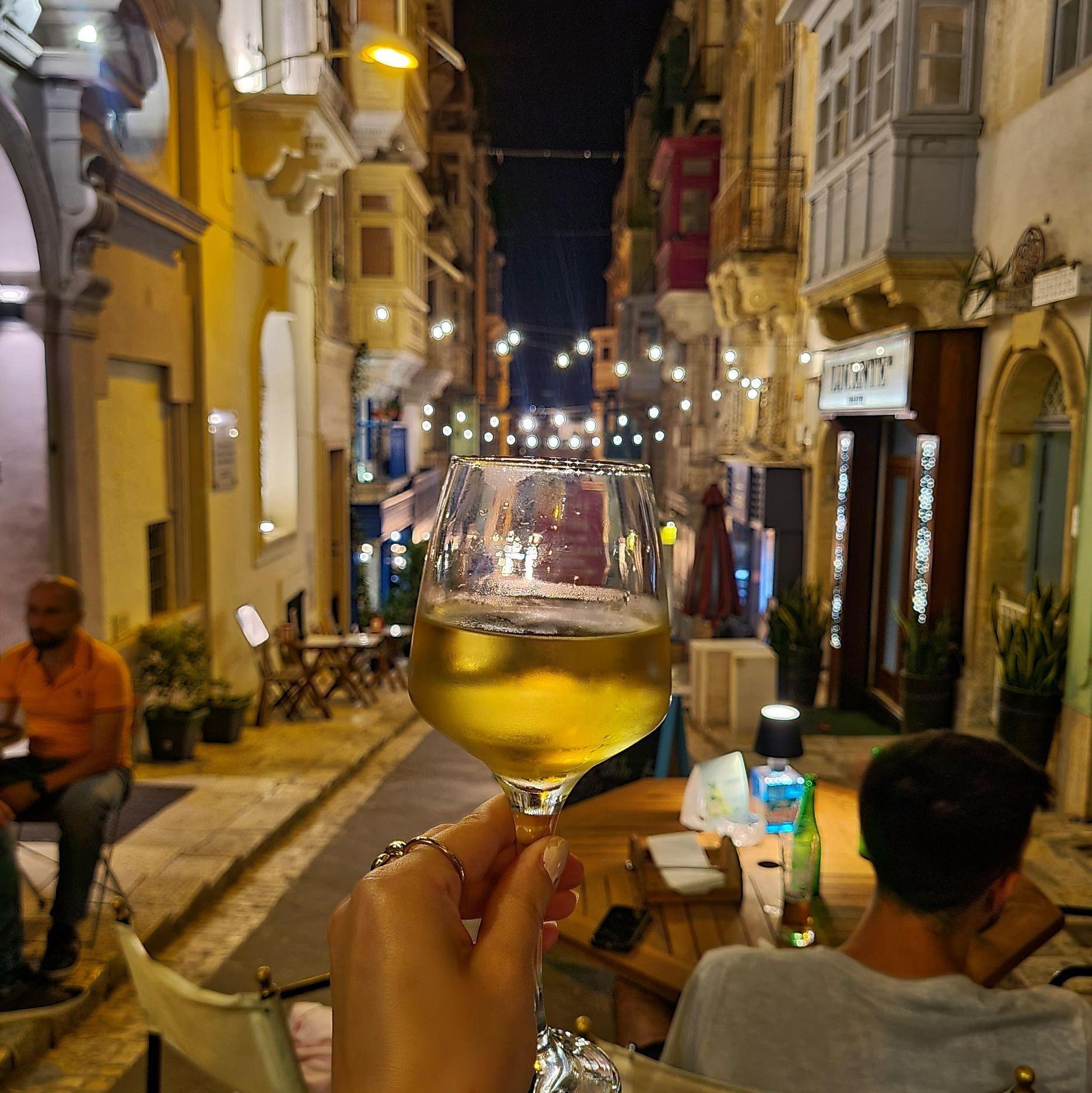 Nothing like a glass of wine sitting on Strait Street Valletta :)