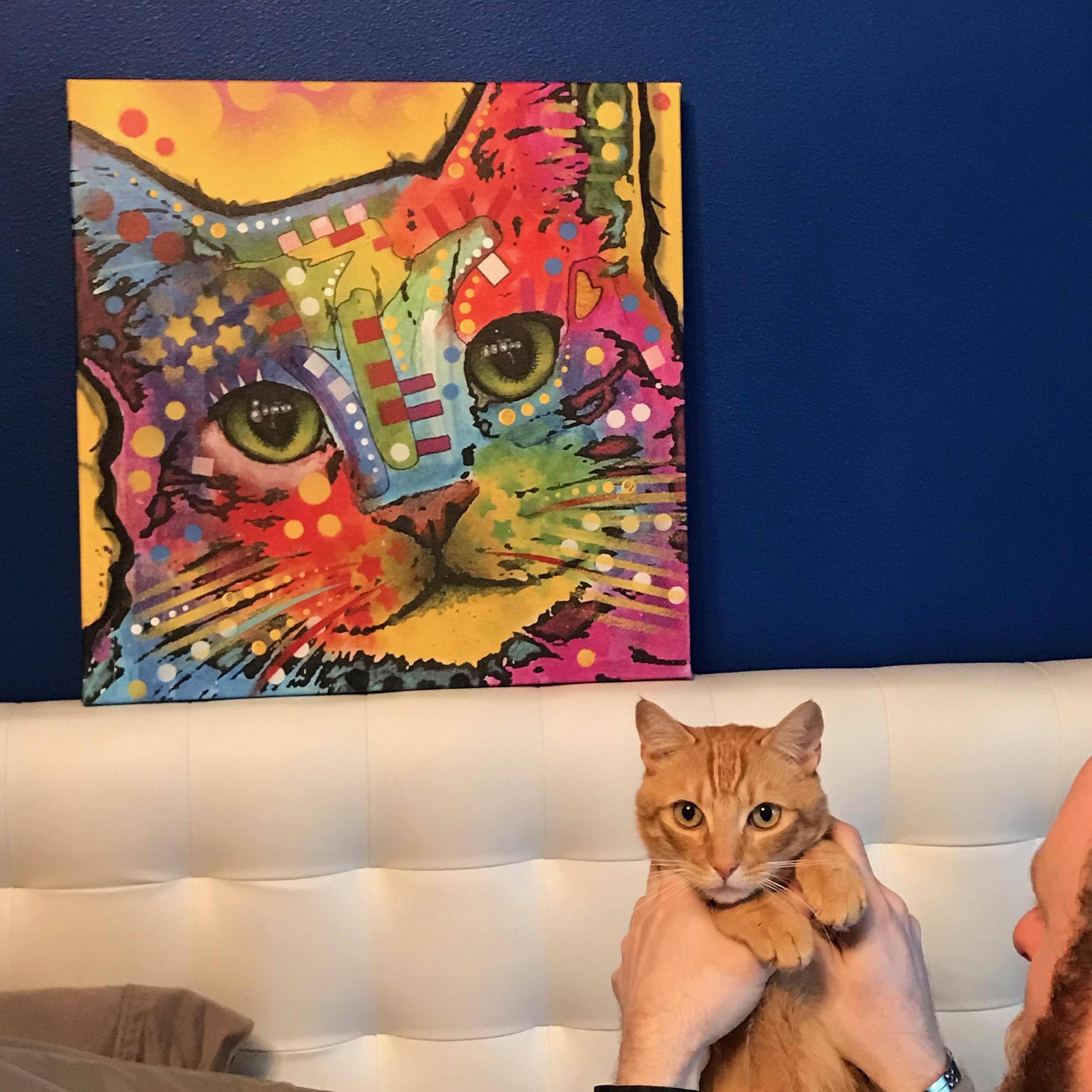 Our Hobbsey posing next to his look alike painting at our home in Washington