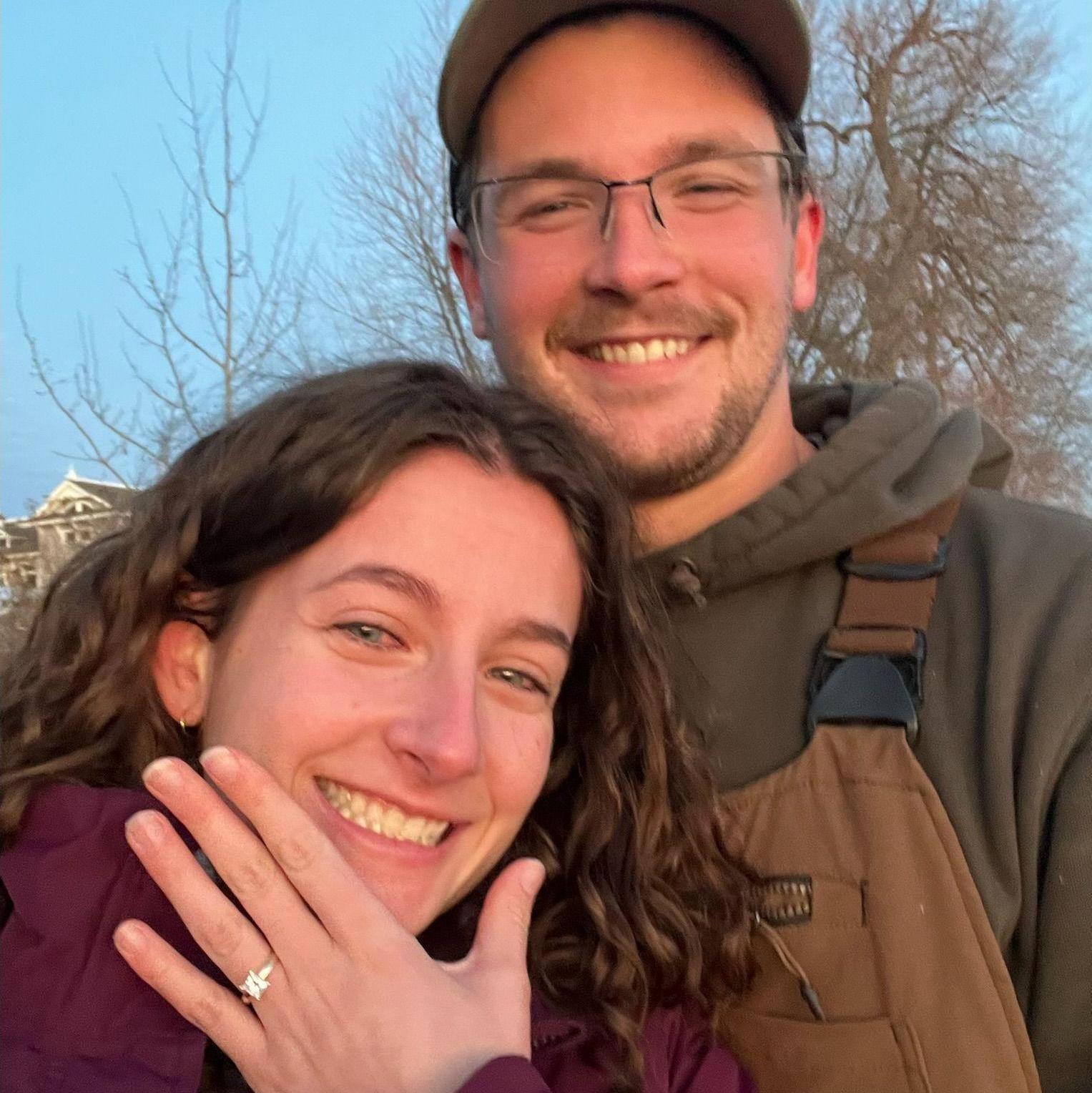 Two happy and cold newly engaged fiances!
