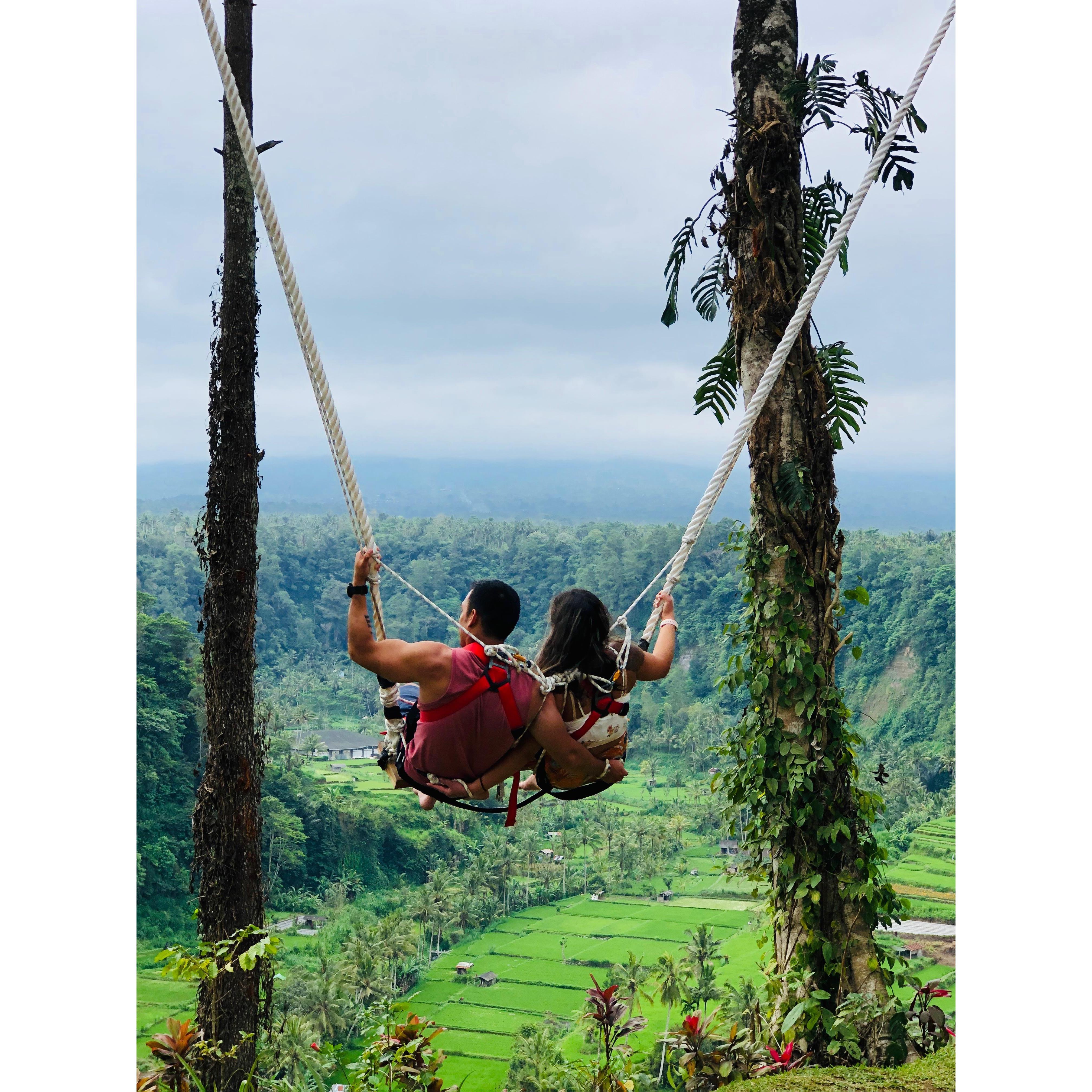 Swinging over rice paddy fields, Bali. September, 2019.