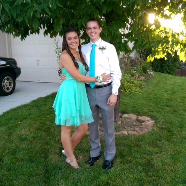 Chase and Emma's homecoming in 2014! To this day Chase still teases Emma for picking a dress that was so hard to match his tie to.