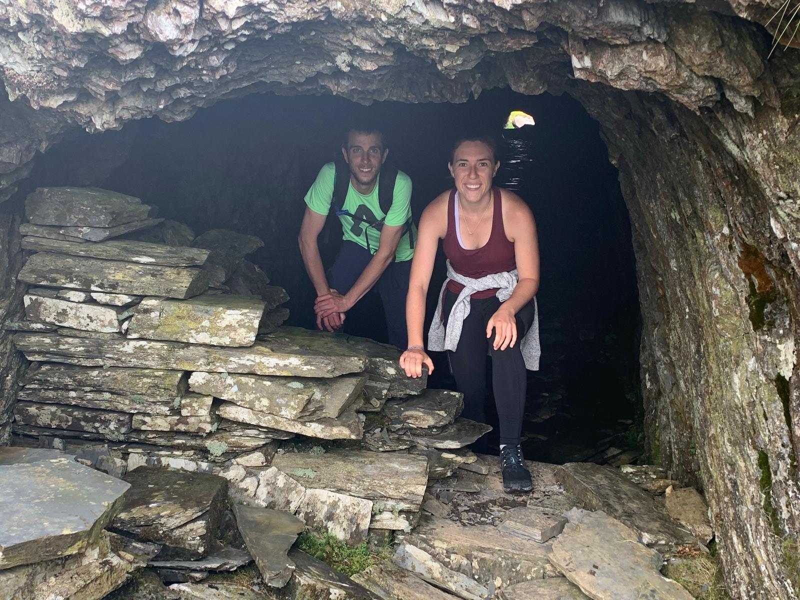 Exploring an old slate mining cave in Snowdonia National Park, Wales