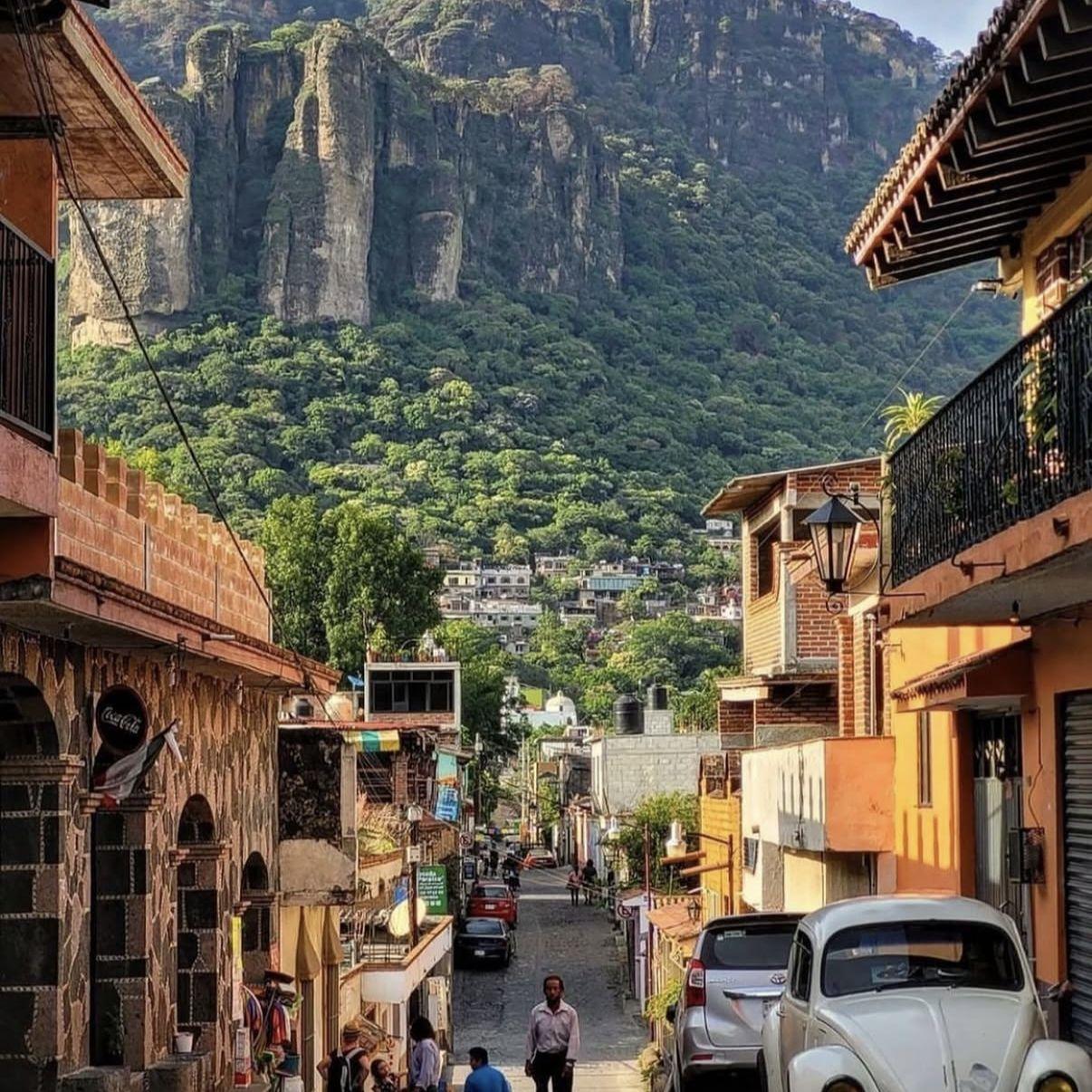 The town of tepotlzan is surrounded by green lush mountains and is known for its local mystic energy