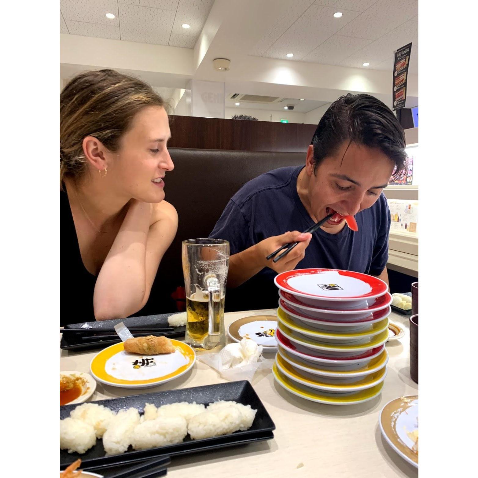 Judging his sushi intake in Tokyo