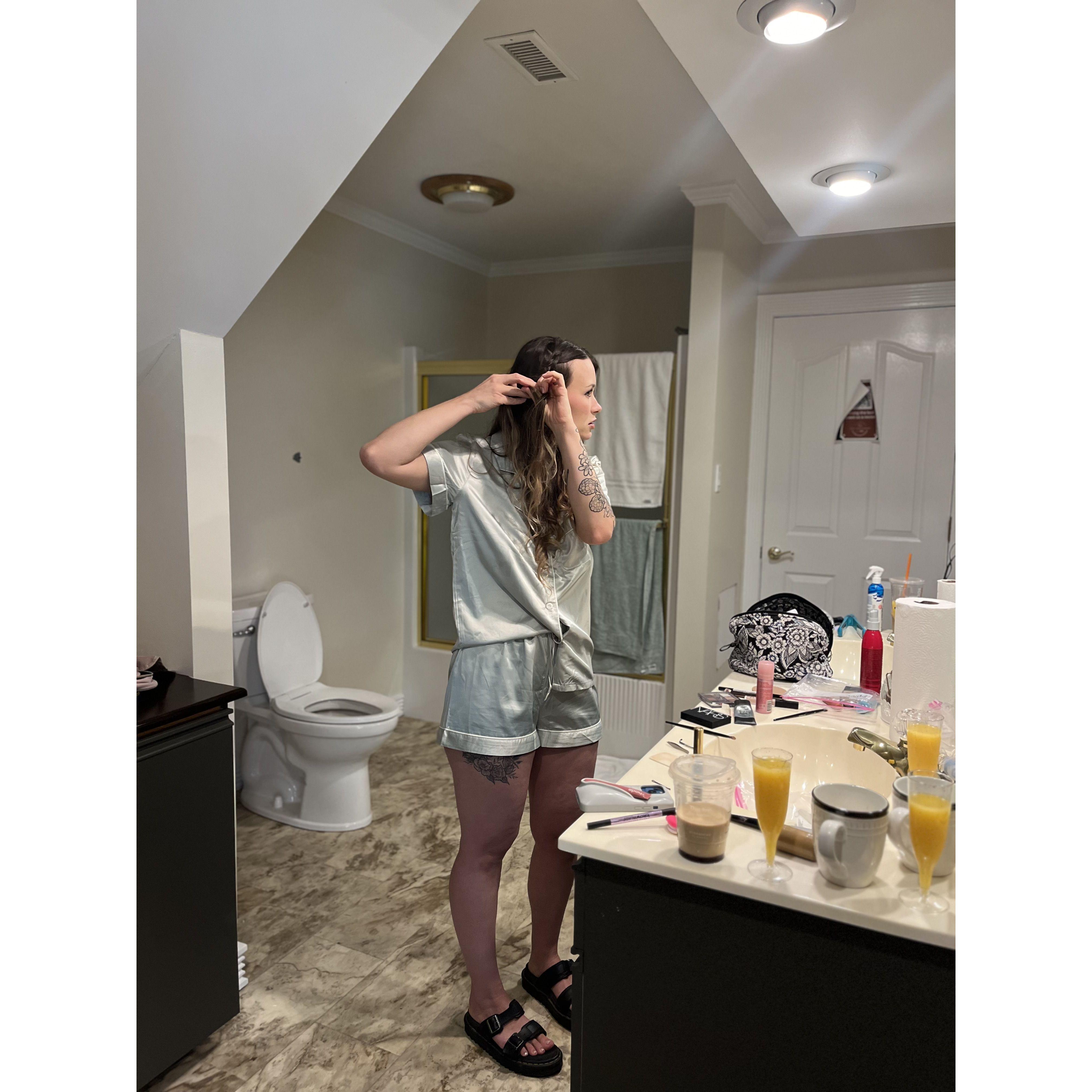 Shian doing her hair in the bridal suite