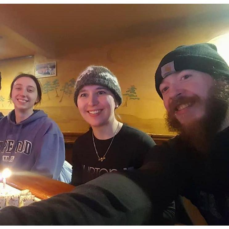 Jess's birthday at Sushi Yoshi (a post snowboarding staple), Matt had them put a candle in her sushi