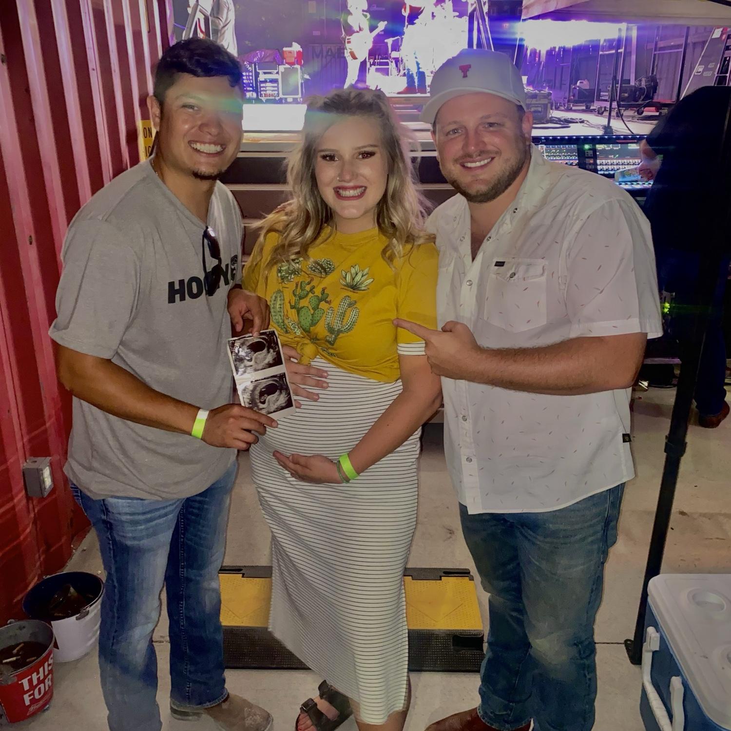 Josh Abbott Band is so special to our relationship for taking us backstage to take a pic so we could announce our pregnancy 🖤