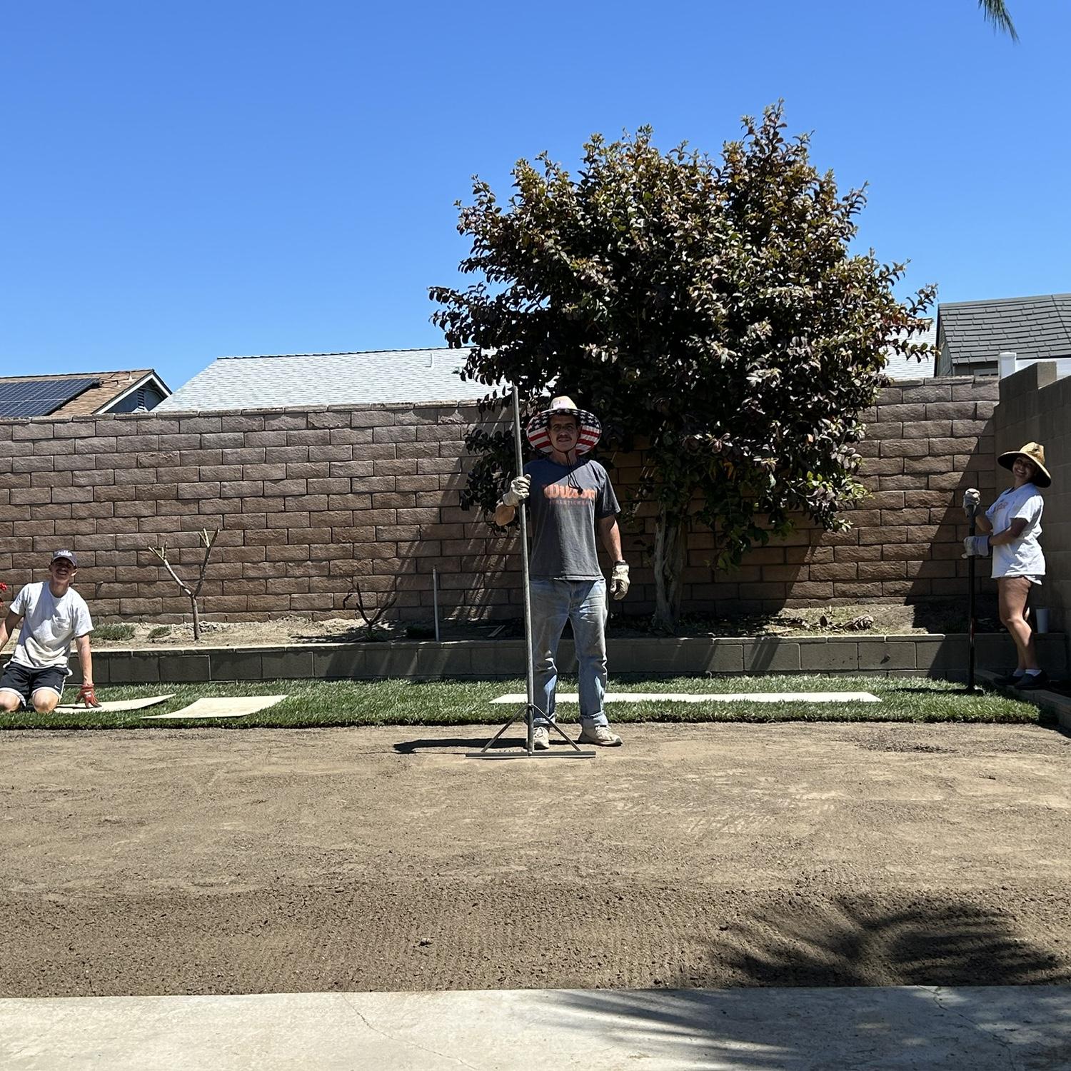 Putting in new grass in our backyard