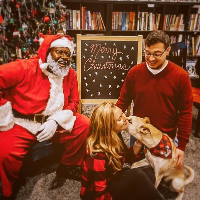 Our first Christmas photo as a family-- featuring our friend Anthony as Santa!