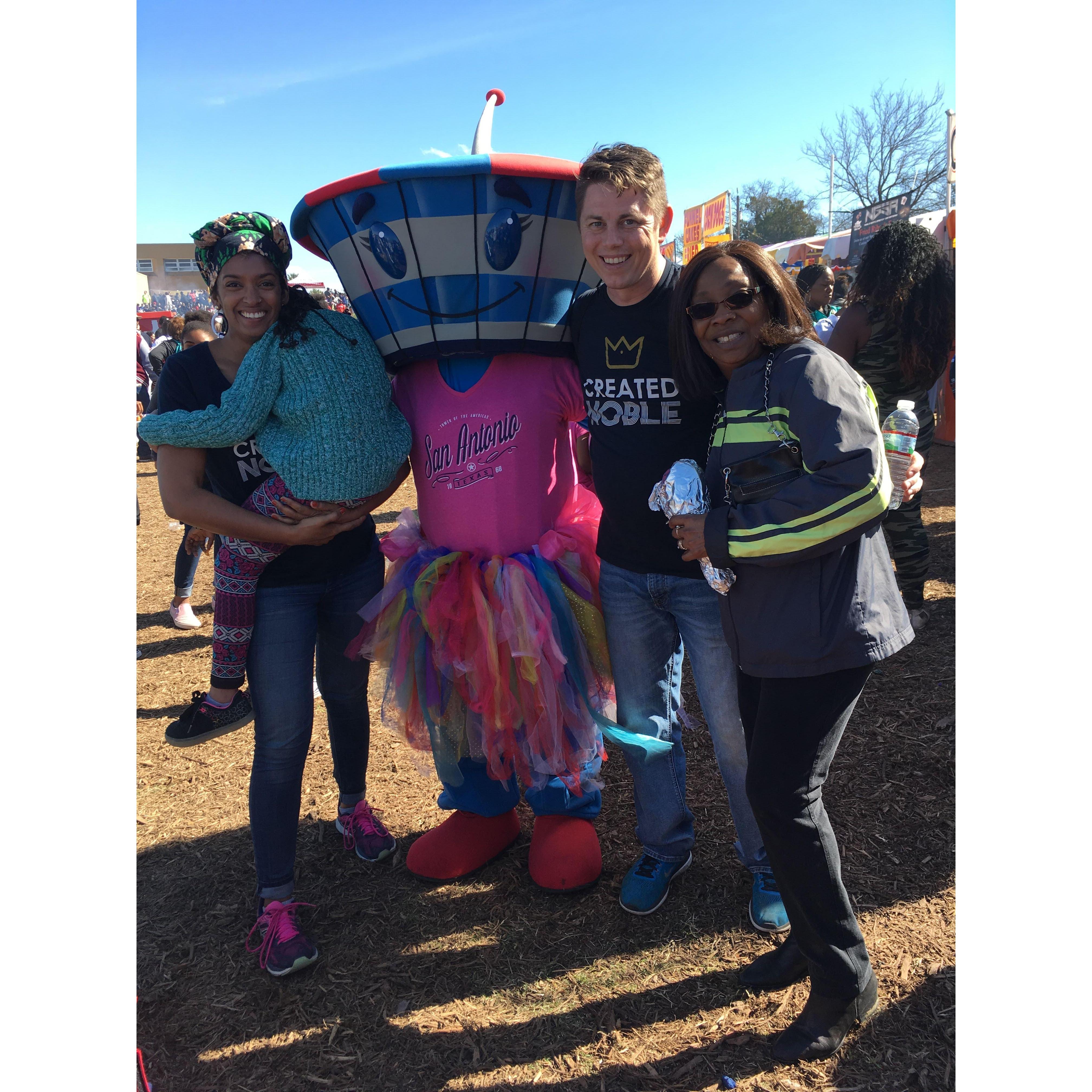 Layla couldn't care less that San Antonio's Tower of the America's had come to life and put on a tutu for the occasion of the MLK March (San Antonio, Jan. 2019)