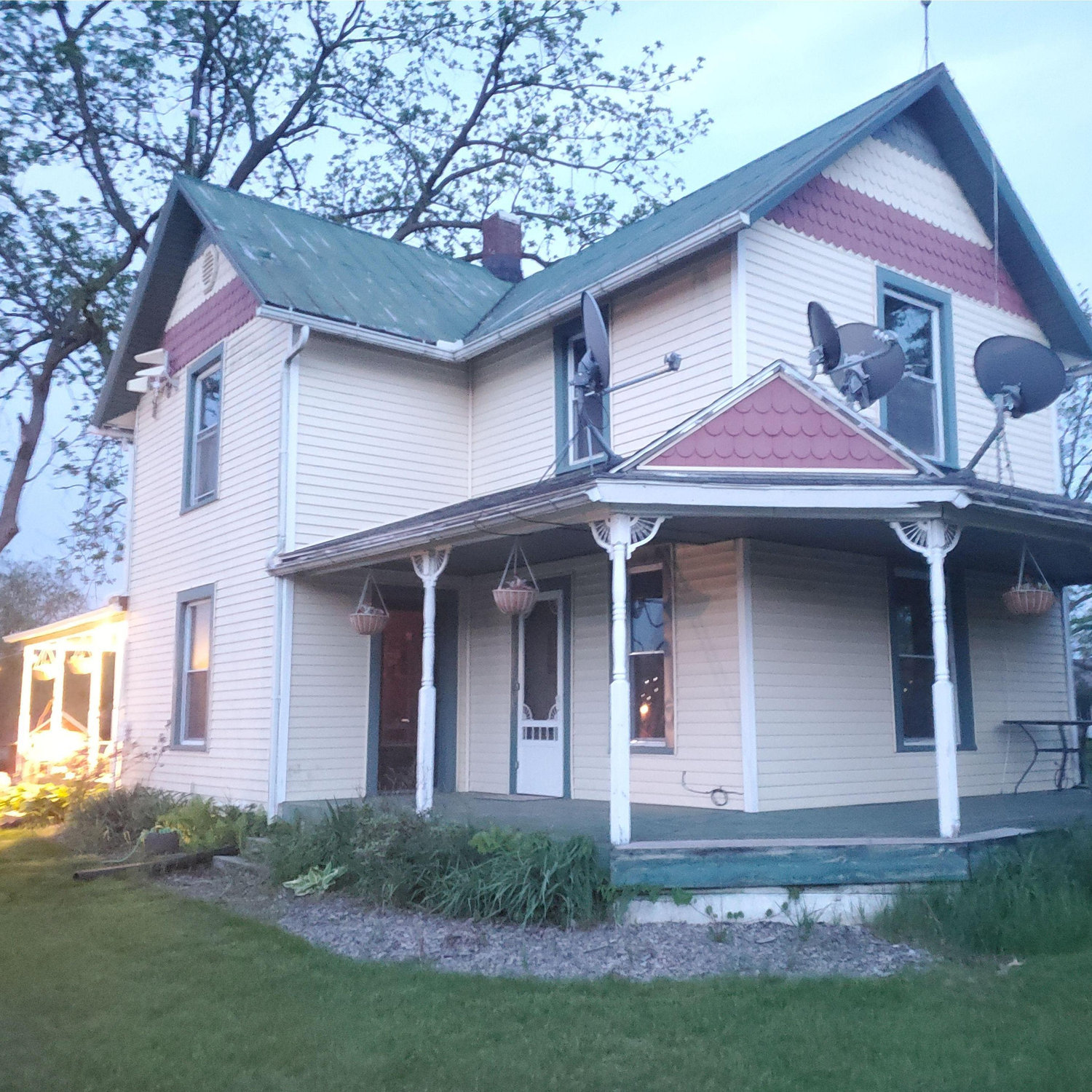 Showing off the new porch lights on the redone porch Tyler finished end of 2023