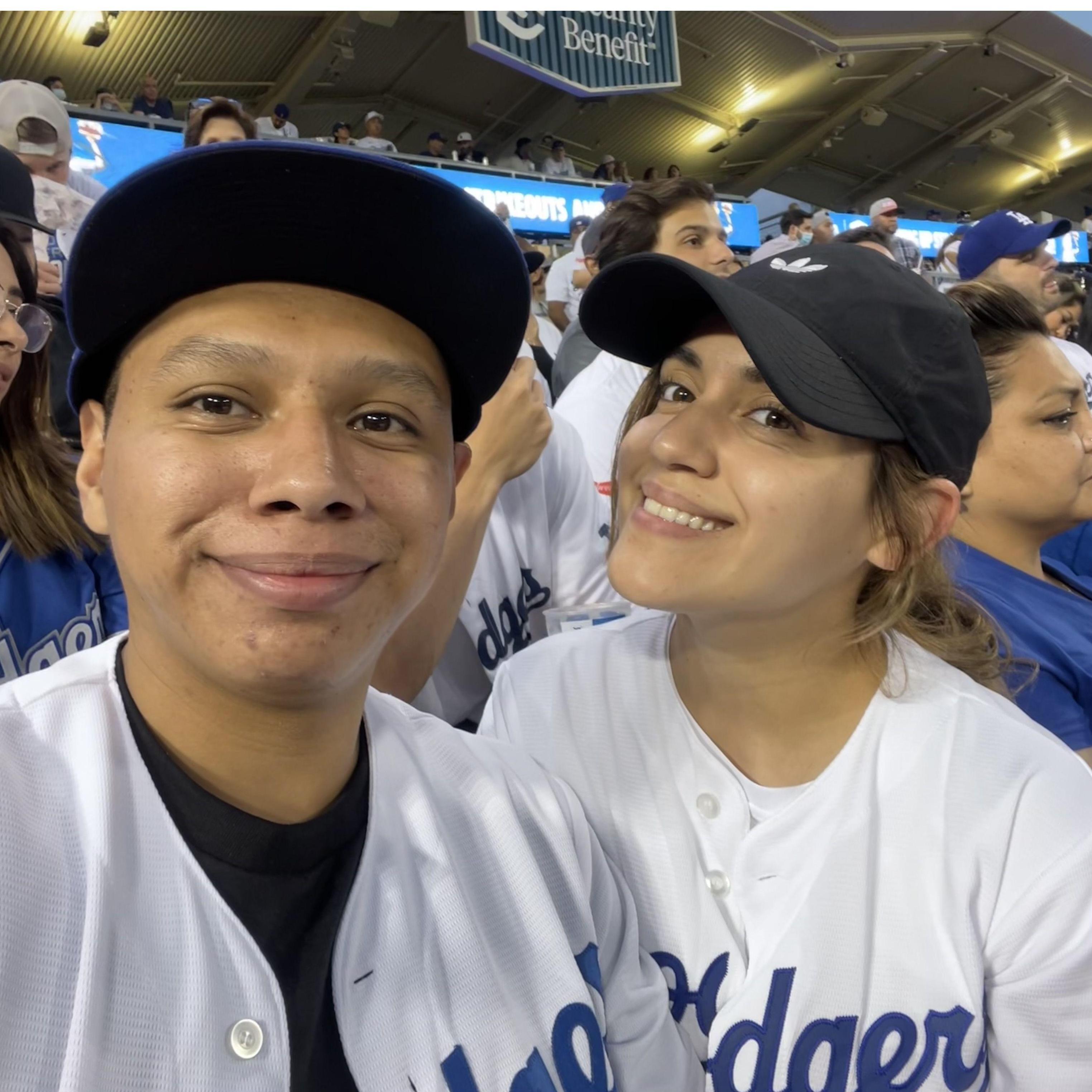 One of many Dodger games. Jocelyne slowly warming up to them. :P