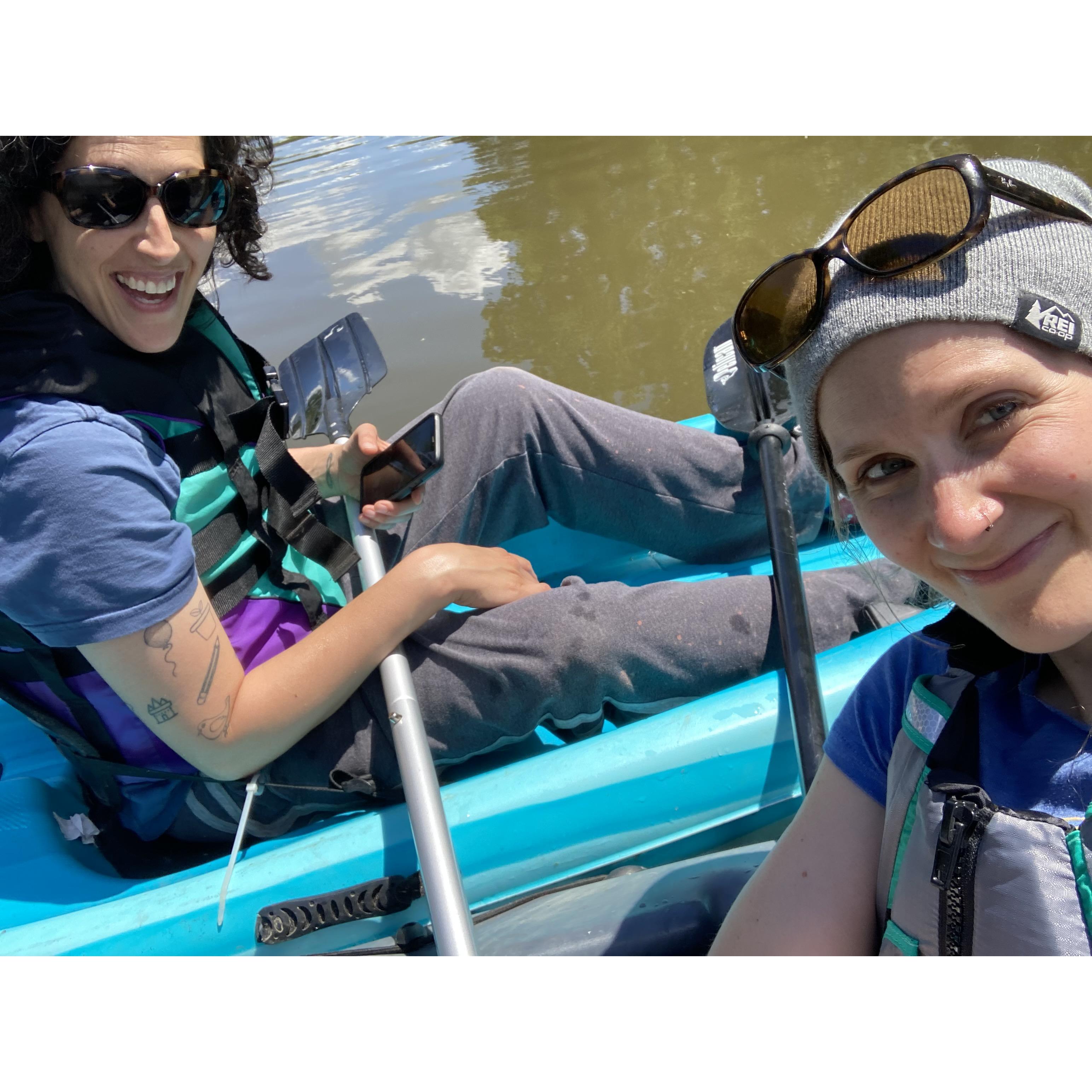 Two goofs on a lake.