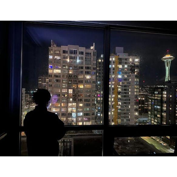 2/26/23 Cassidy & I moved into a highrise unit in the building we met. This was the nighttime view from our living room (of the Puget Sound & Olympic Mountains). Views of Seattle never got old. -bp