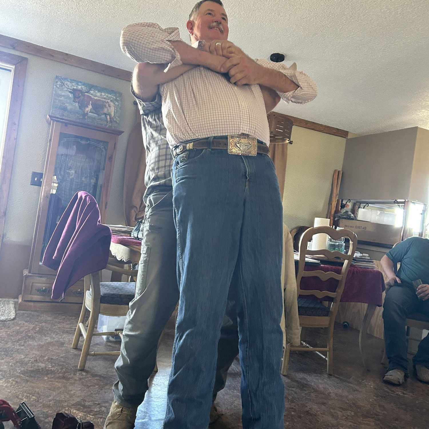 Luke gives Kenny an adjustment