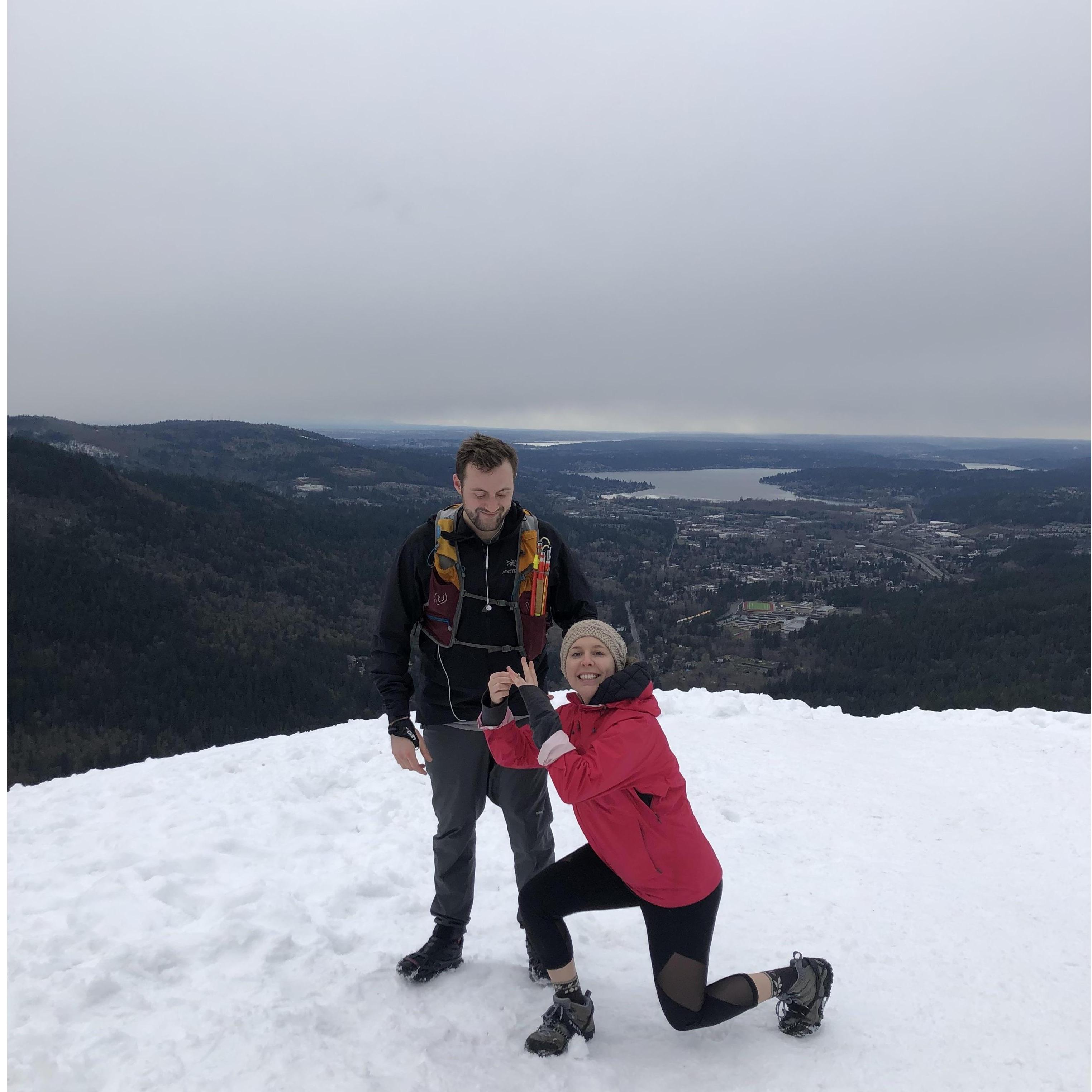 Julie enacting her fantasy of proposing to Evan on Poo Poo Point, Issaquah