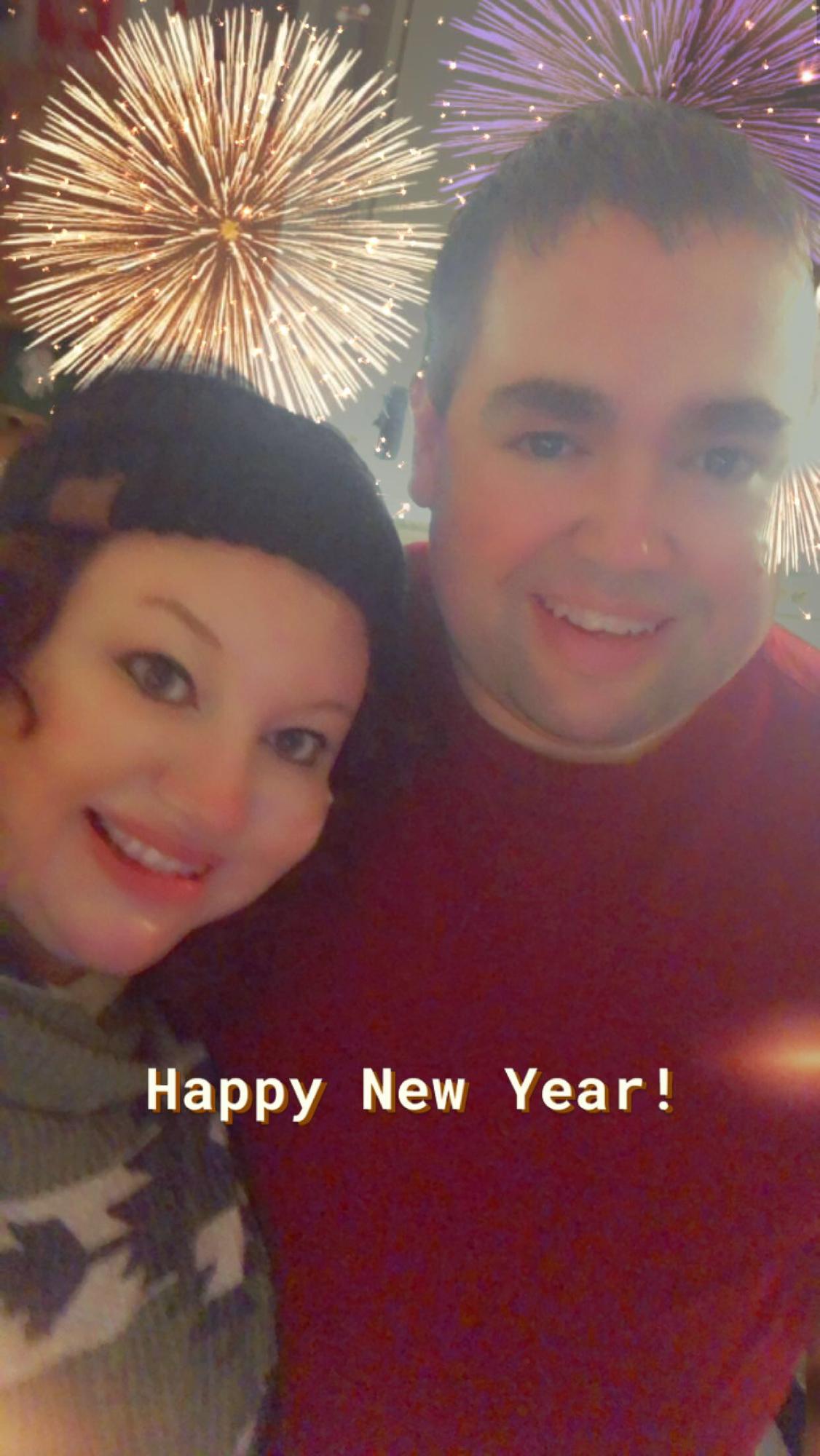 Our very first photo together. Just after midnight on 1/1/21