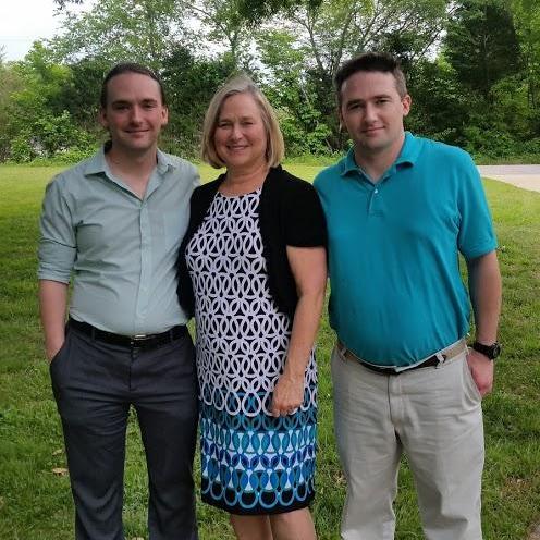 Grant with his mom, Delia, and brother, Stuart.