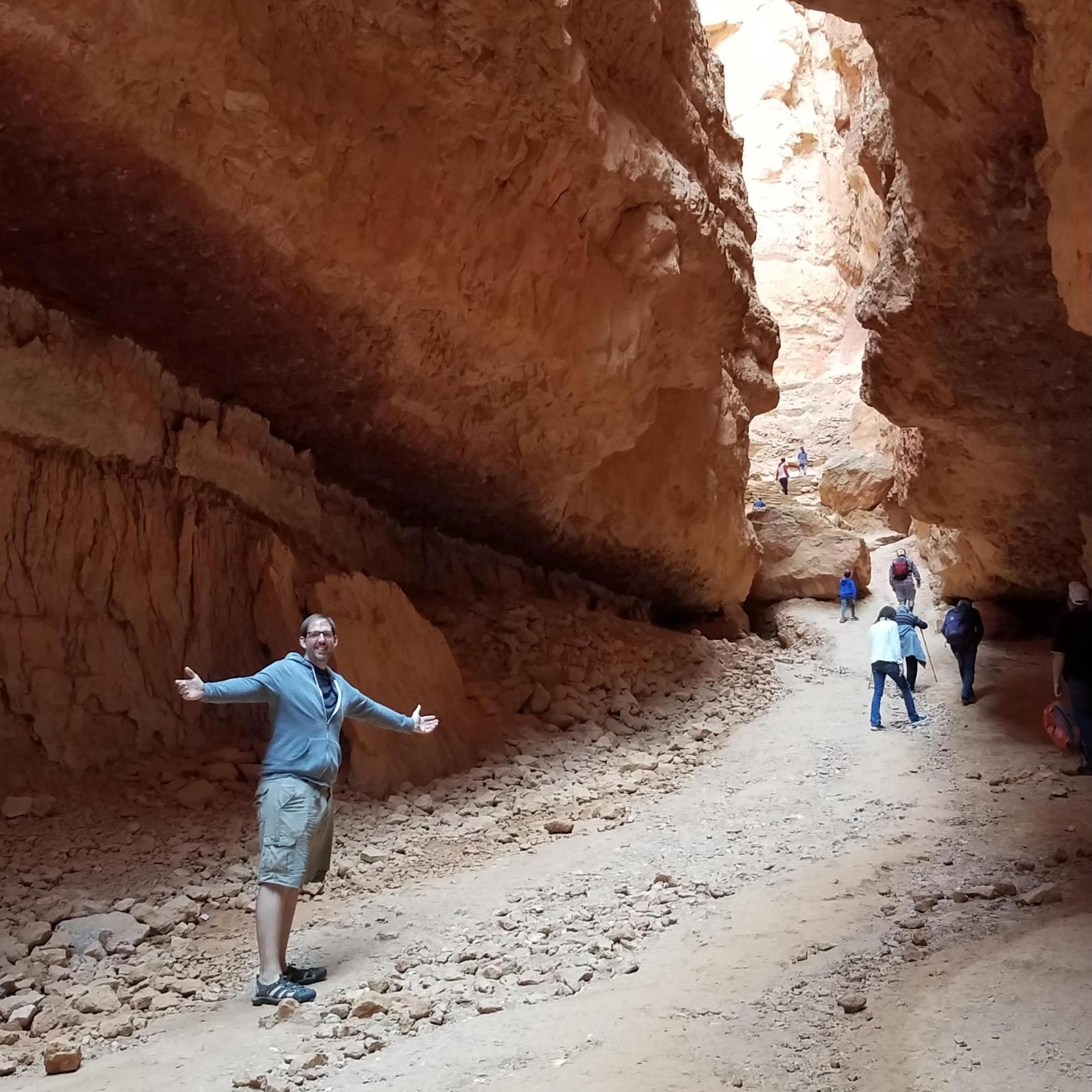 Casey in a Bryce Canyon slot canyon on our drive cross country to move to Charlotte. Something that actually makes him look short - crazy, right?