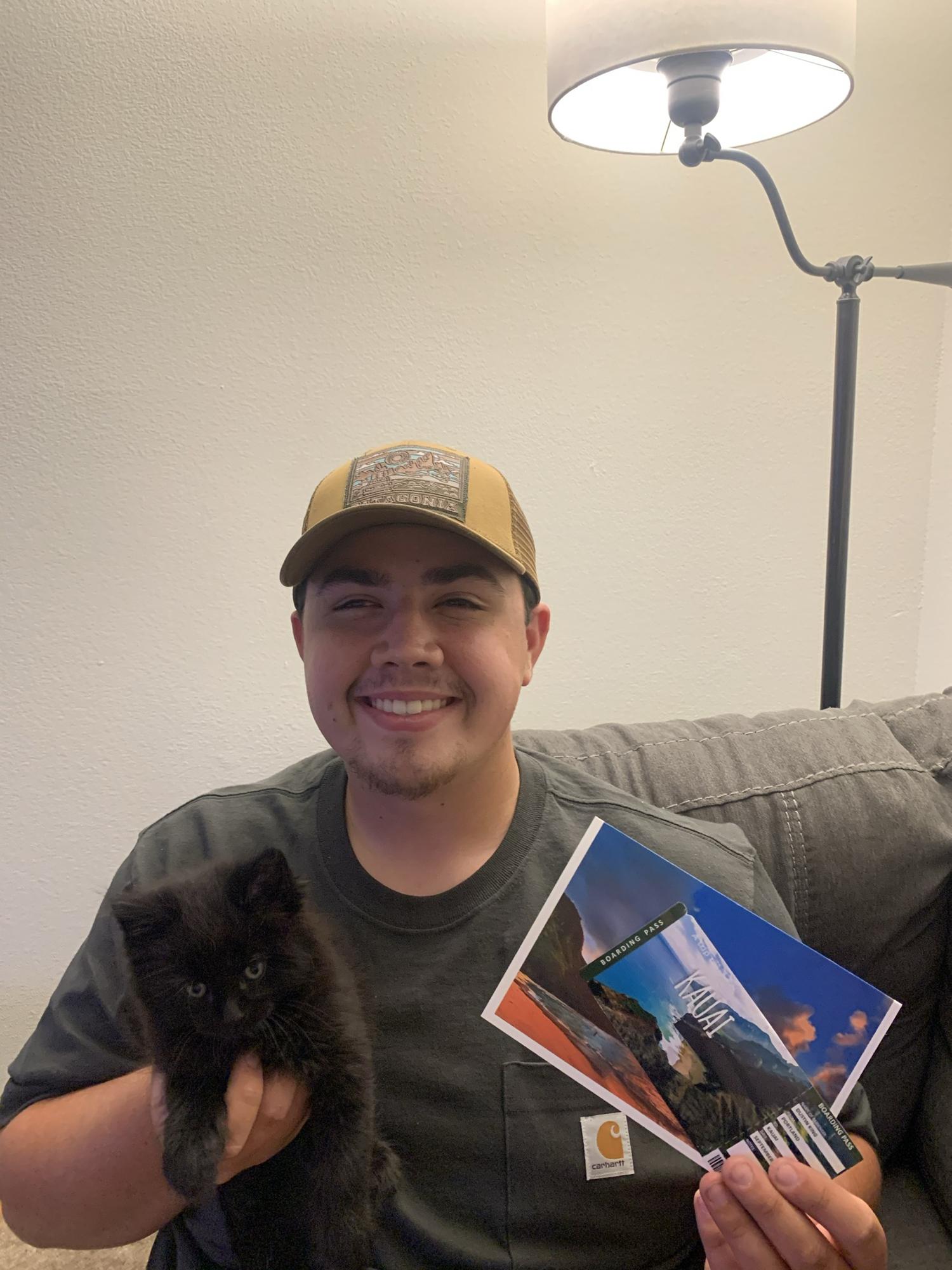 Maya surprising Dustin with a kitten and tickets to Hawaii for his 21st birthday