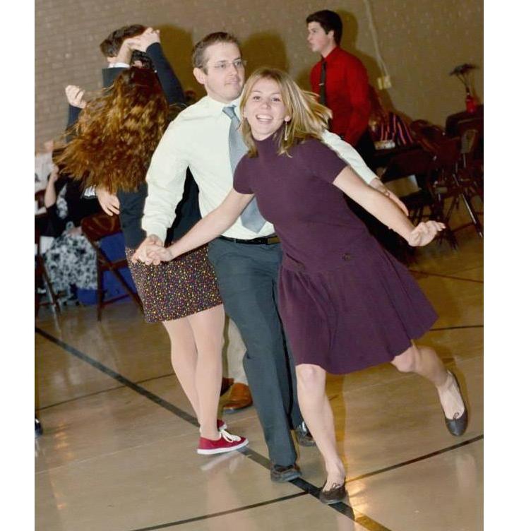 Dancing together at a friend's wedding