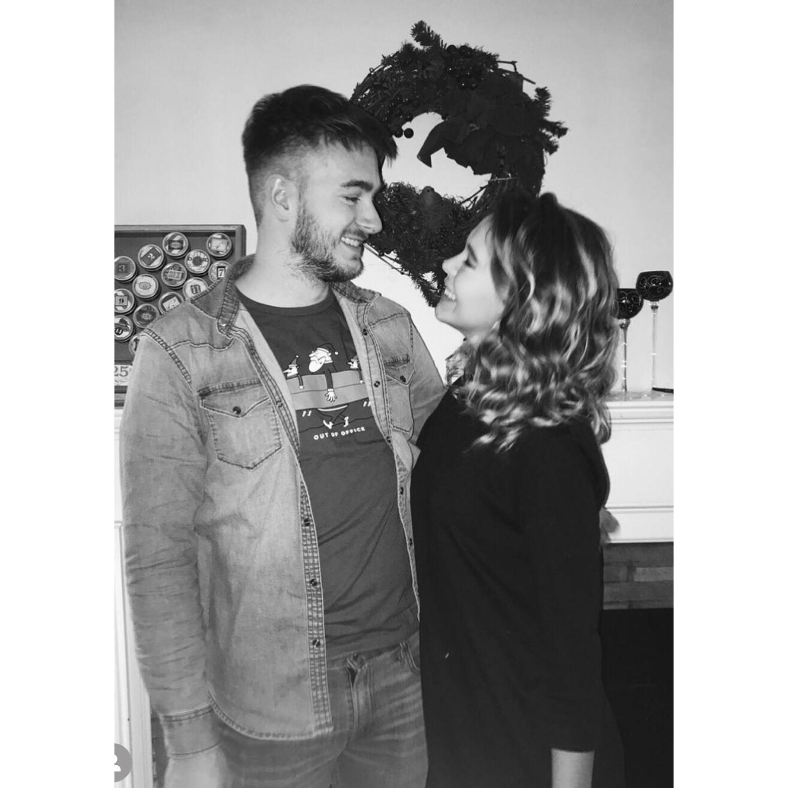 First Christmas party together. Would you look at those smiles...