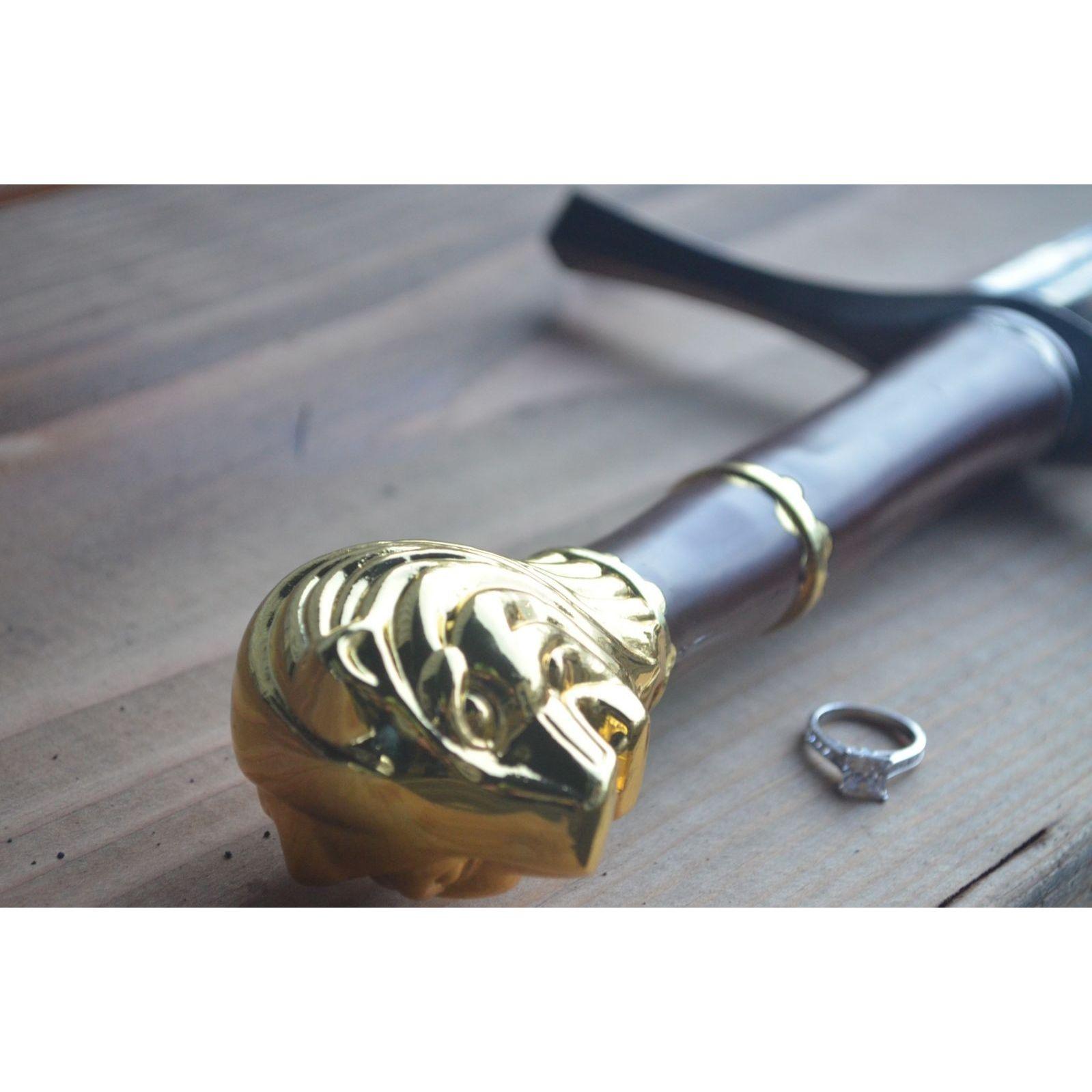 Artistic shot of the ring. And yes, he did propose with a sword.