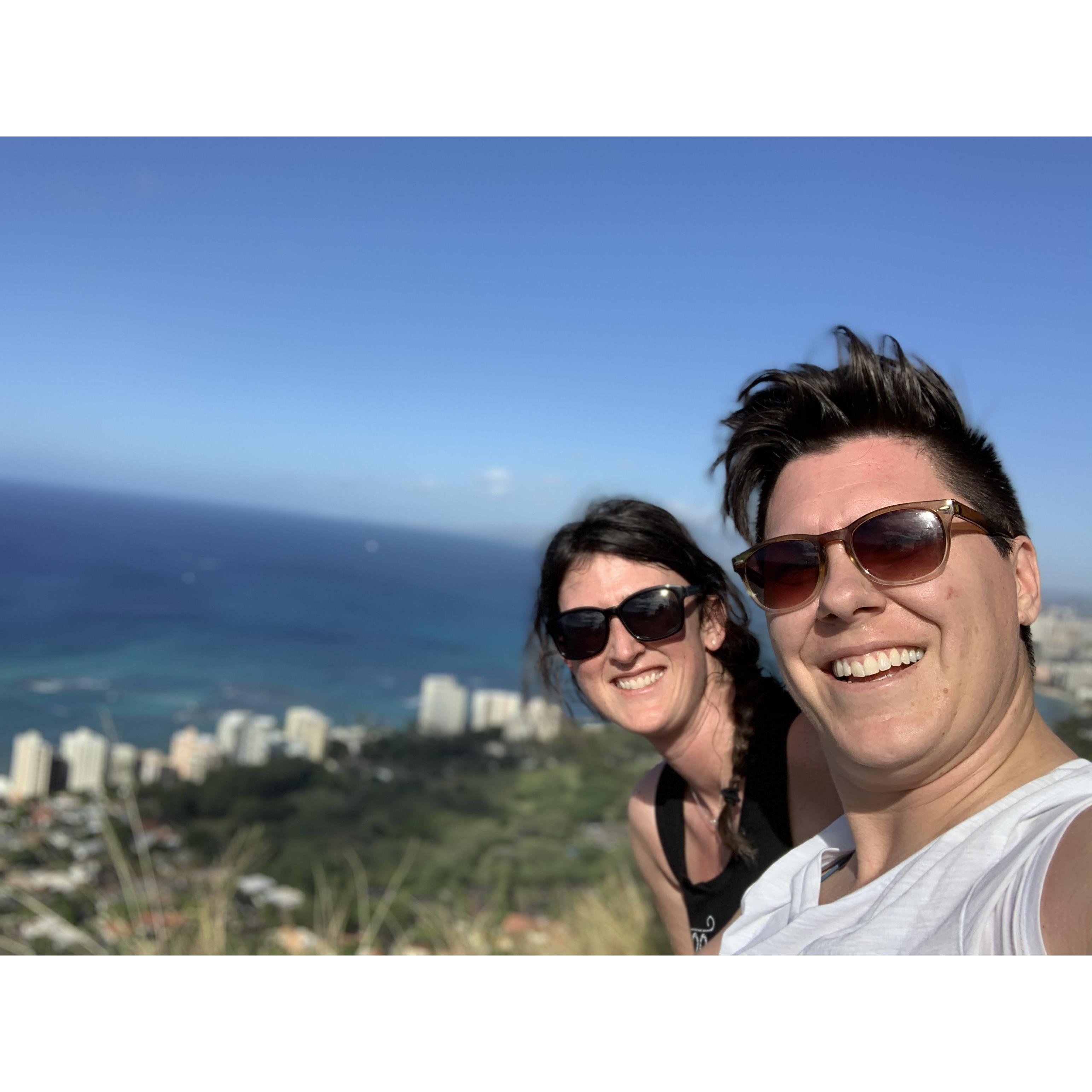 Rented scooters and explored Oahu! Taking a break to check out the views atop Diamond Head.