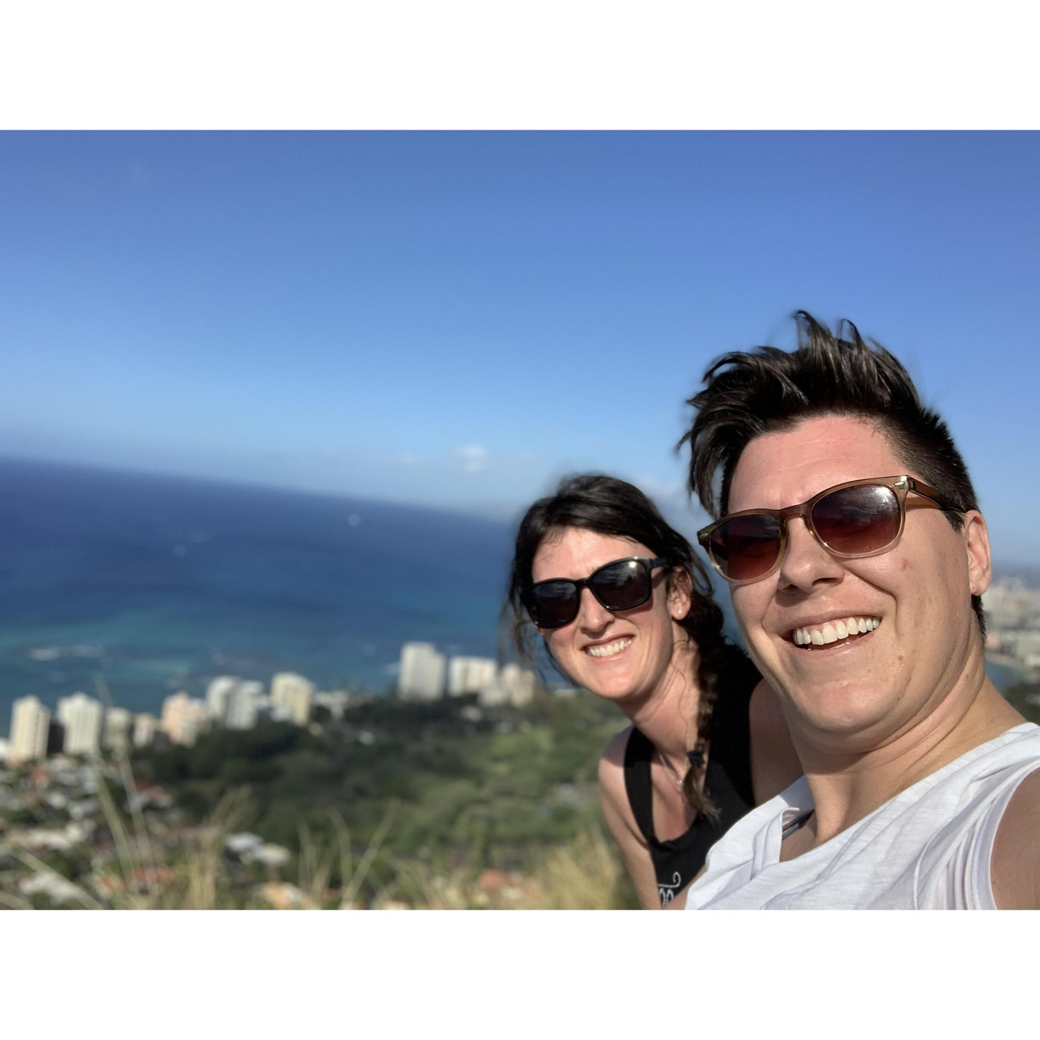 Rented scooters and explored Oahu! Taking a break to check out the views atop Diamond Head.