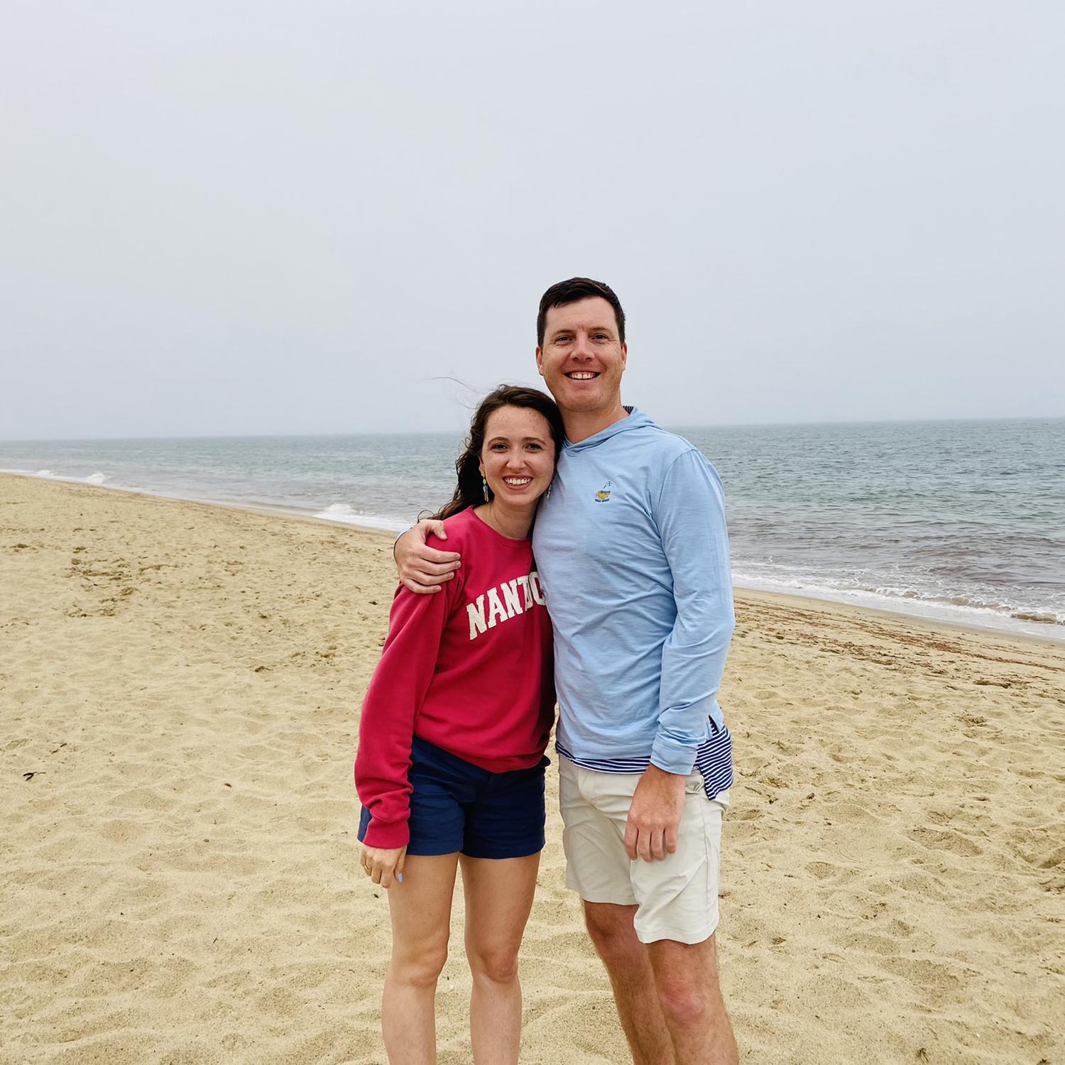 July 2022 - Walking Sconset beach in Nantucket, MA. Ended up being our Christmas card photo in 2022!