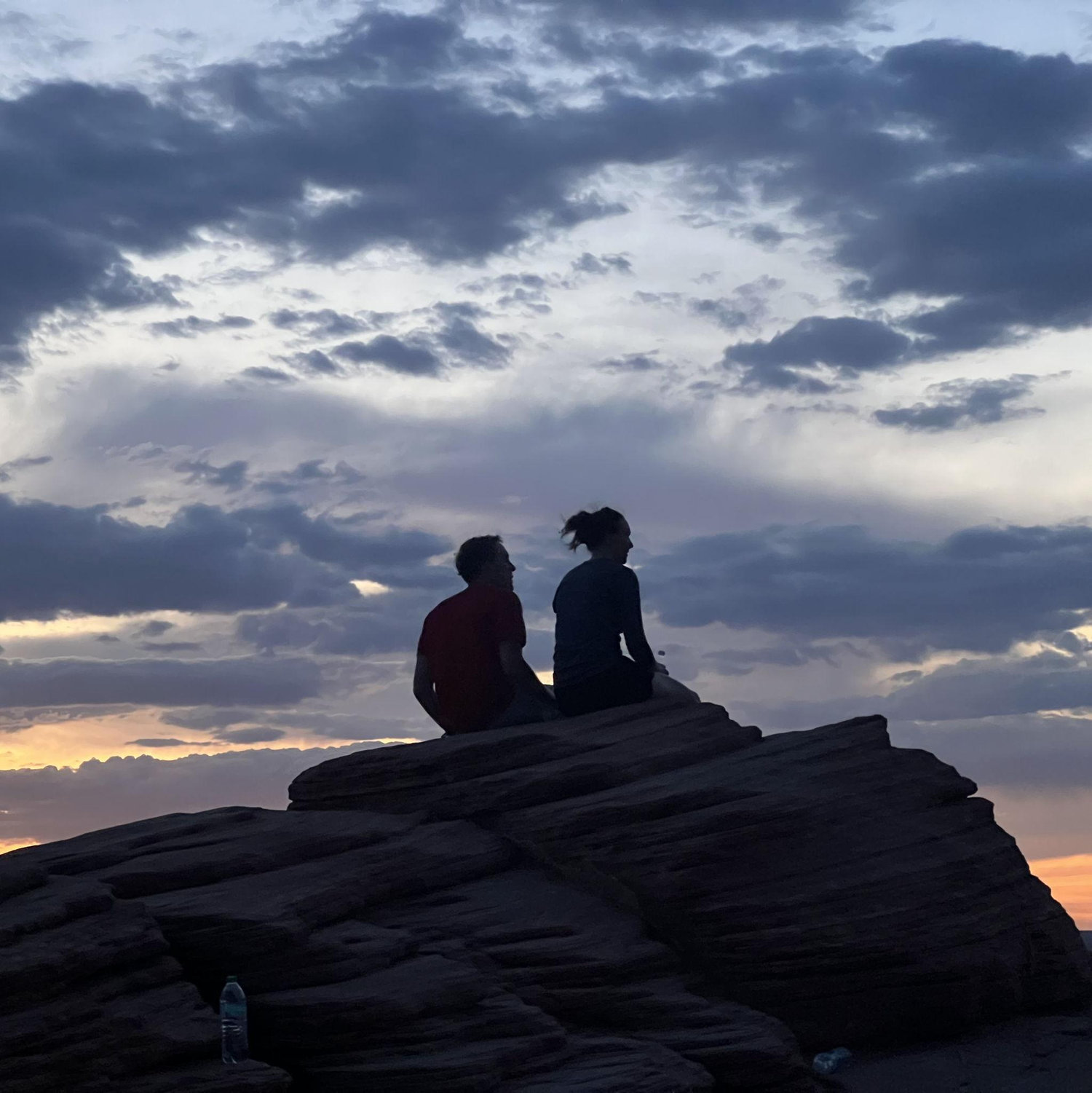 We stopped to watch the sunset at Horseshoe Bend in Arizona. A stranger took this picture of us without us knowing and asked if we wanted it. It instantly became one of our favorites! June 2024.